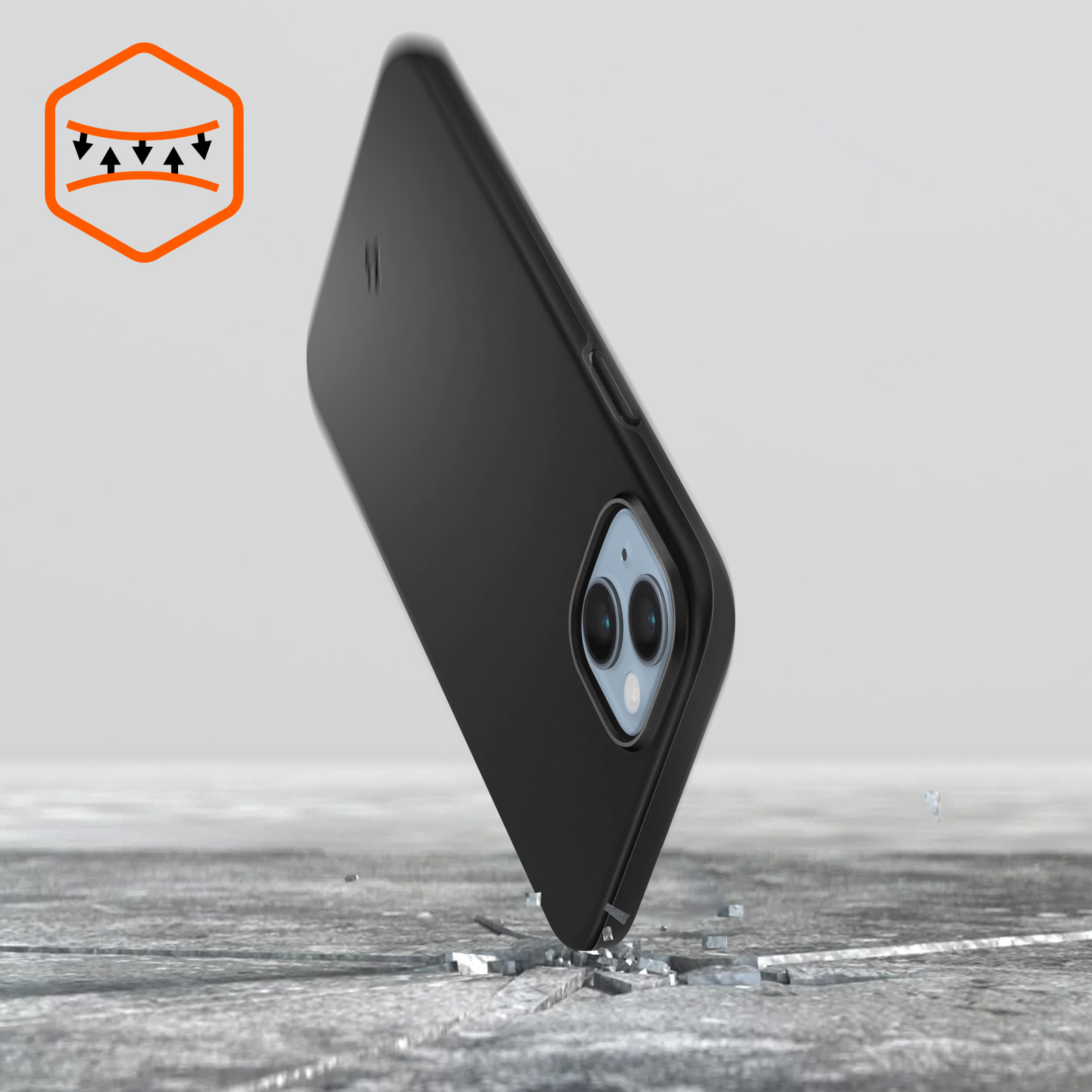 Czarny pokrowiec na telefon chroniący telefon. Telefon znajduje się na szorstkiej, szarej powierzchni. Białe tło.