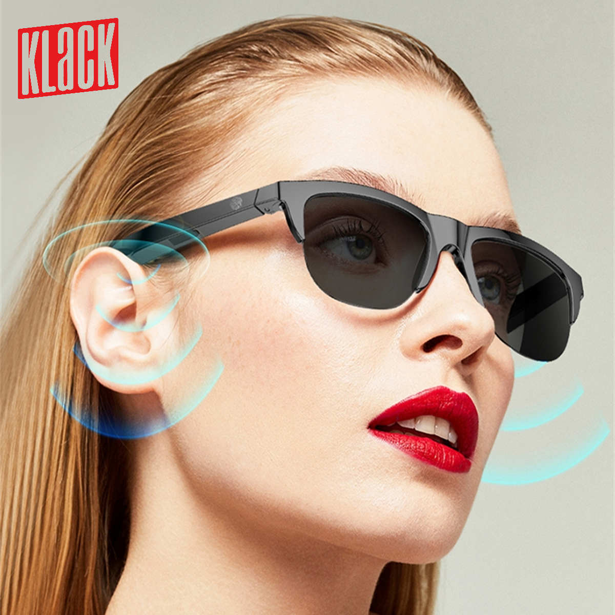Una mujer con gafas de sol negras y lápiz labial rojo, con ondas de sonido.