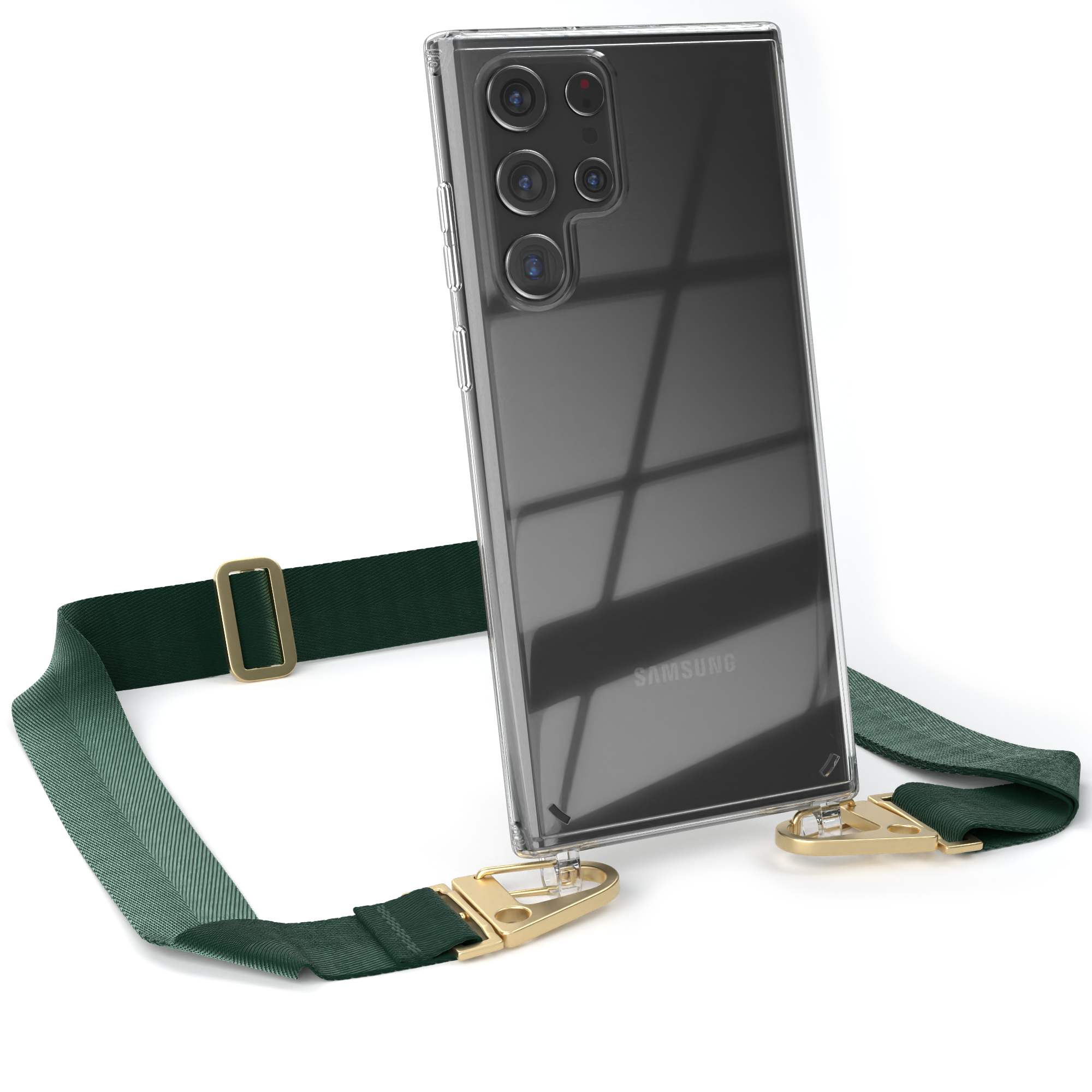 Transparente Handyhülle mit Telefon und grünem Riemen. Goldene Hardware. Weißer Hintergrund.
