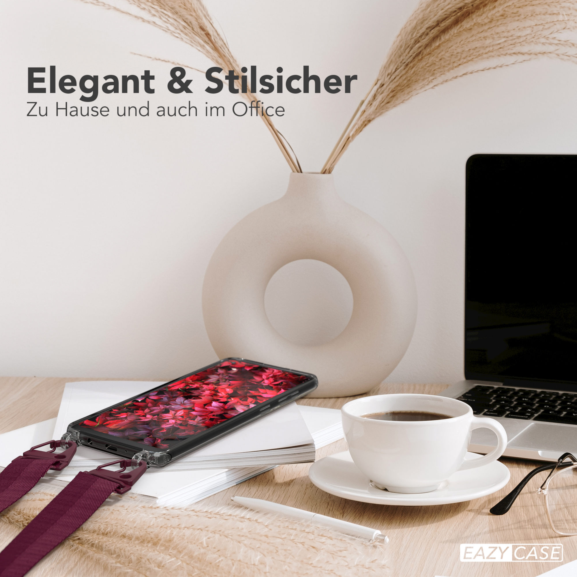 Telefon auf einem Schreibtisch mit Kaffeetasse und Vase. Text: Elegant & Stilsicher. Zuhause und im Büro.