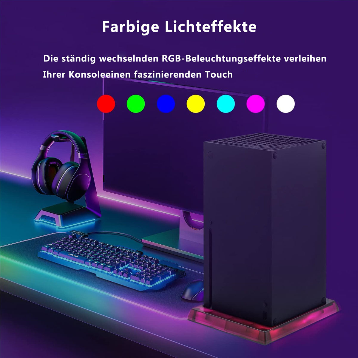 Gaming-Setup mit Monitor, Konsole, Kopfhörern und Tastatur mit Farblichtern.