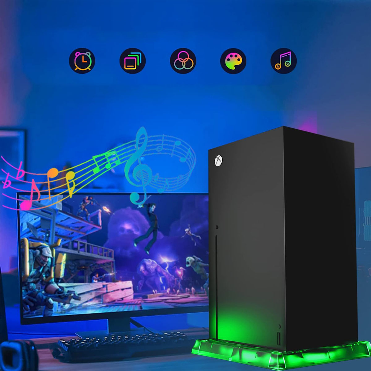 Eine Xbox-Spielkonsole mit grünen Lichtern, einem Monitor und bunten Noten.
