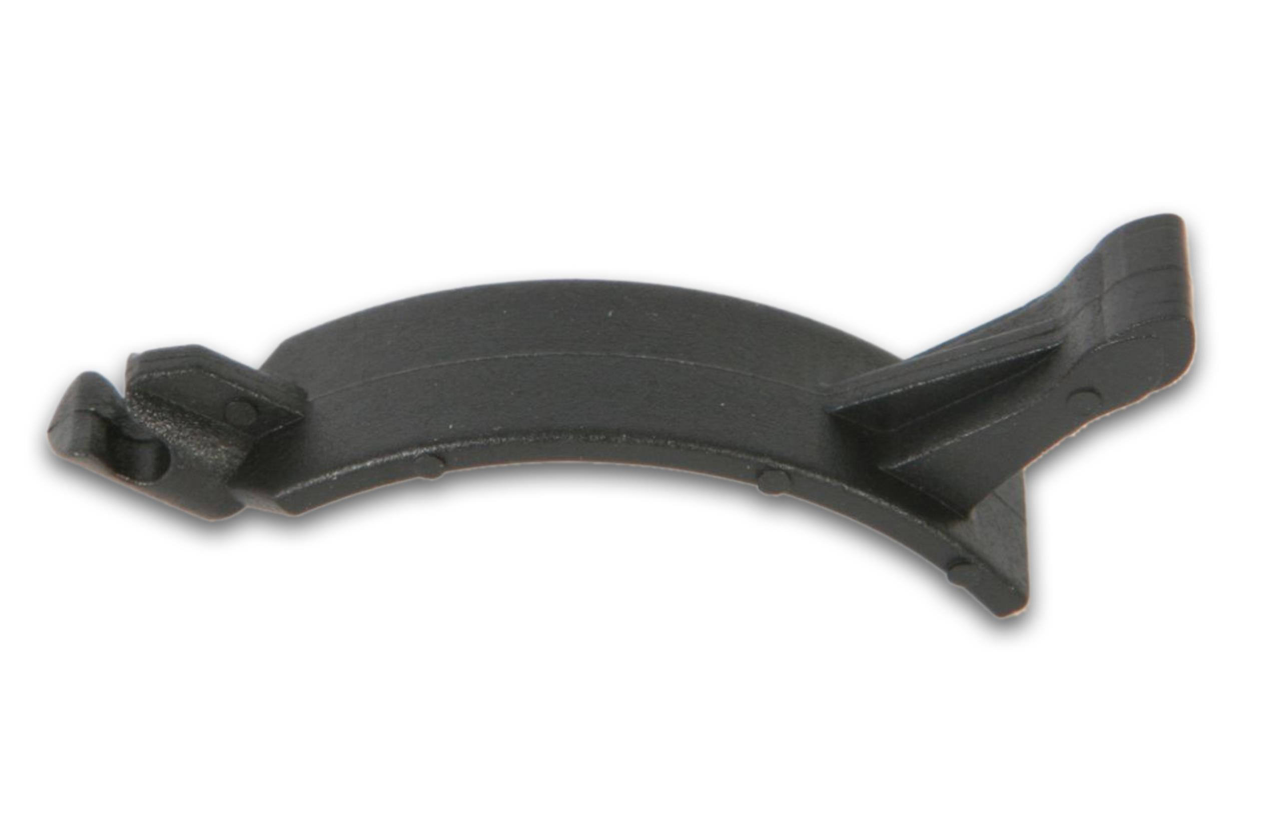 Eine schwarze Kunststoffkomponente, möglicherweise Teil eines größeren Mechanismus.
