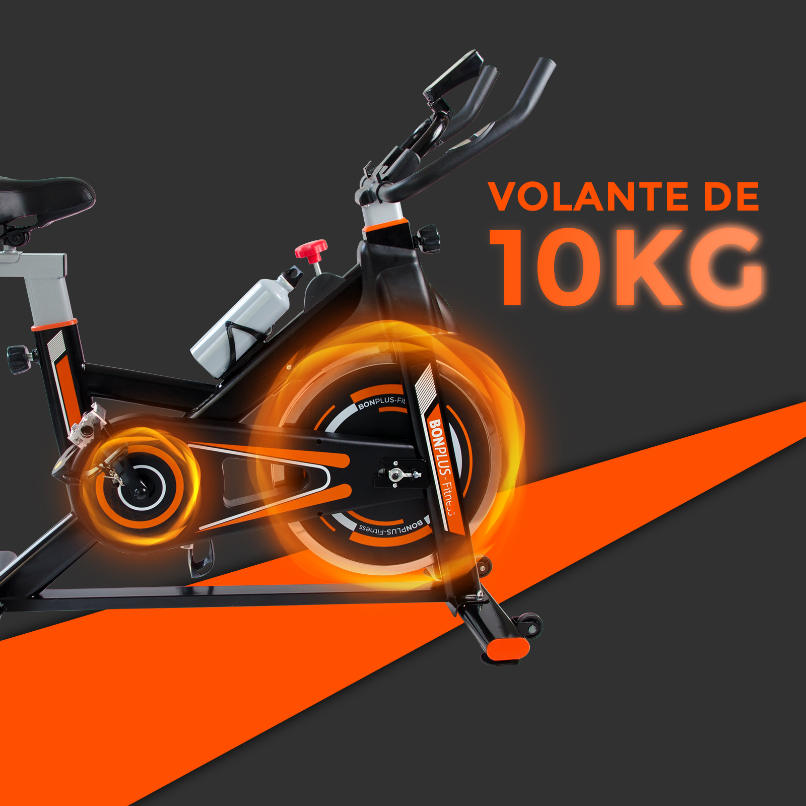 Bicicleta estática con rueda naranja brillante. El texto dice 'VOLANTE DE 10KG'.