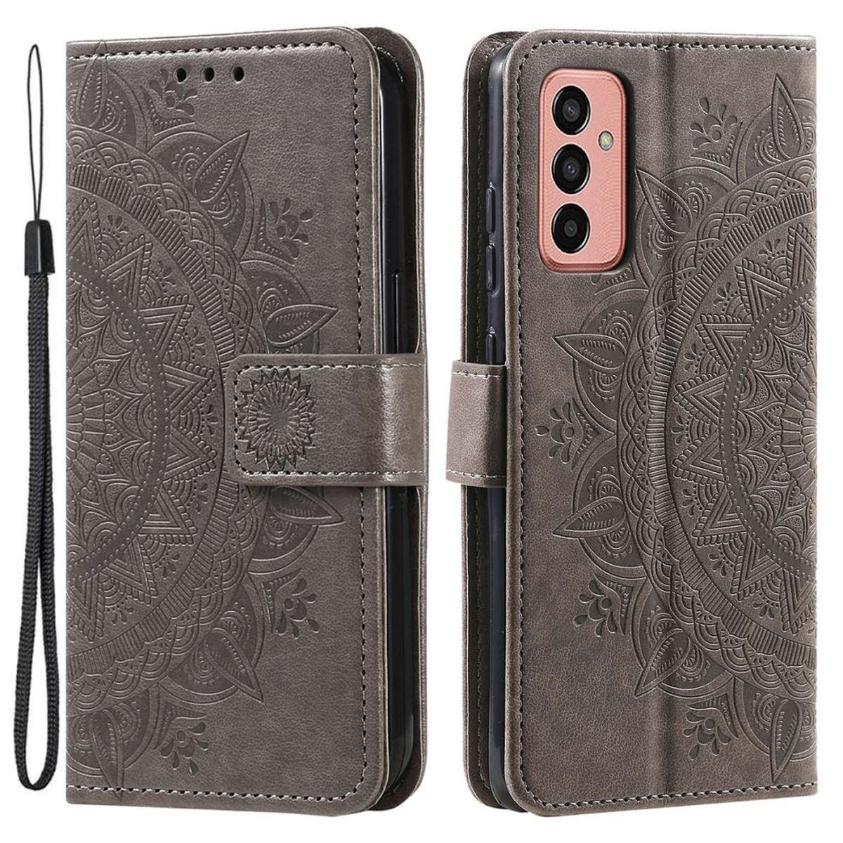 Graue Leder-Handyhülle mit Mandala-Design, offen und geschlossen. Schwarzes Schlüsselband sichtbar.