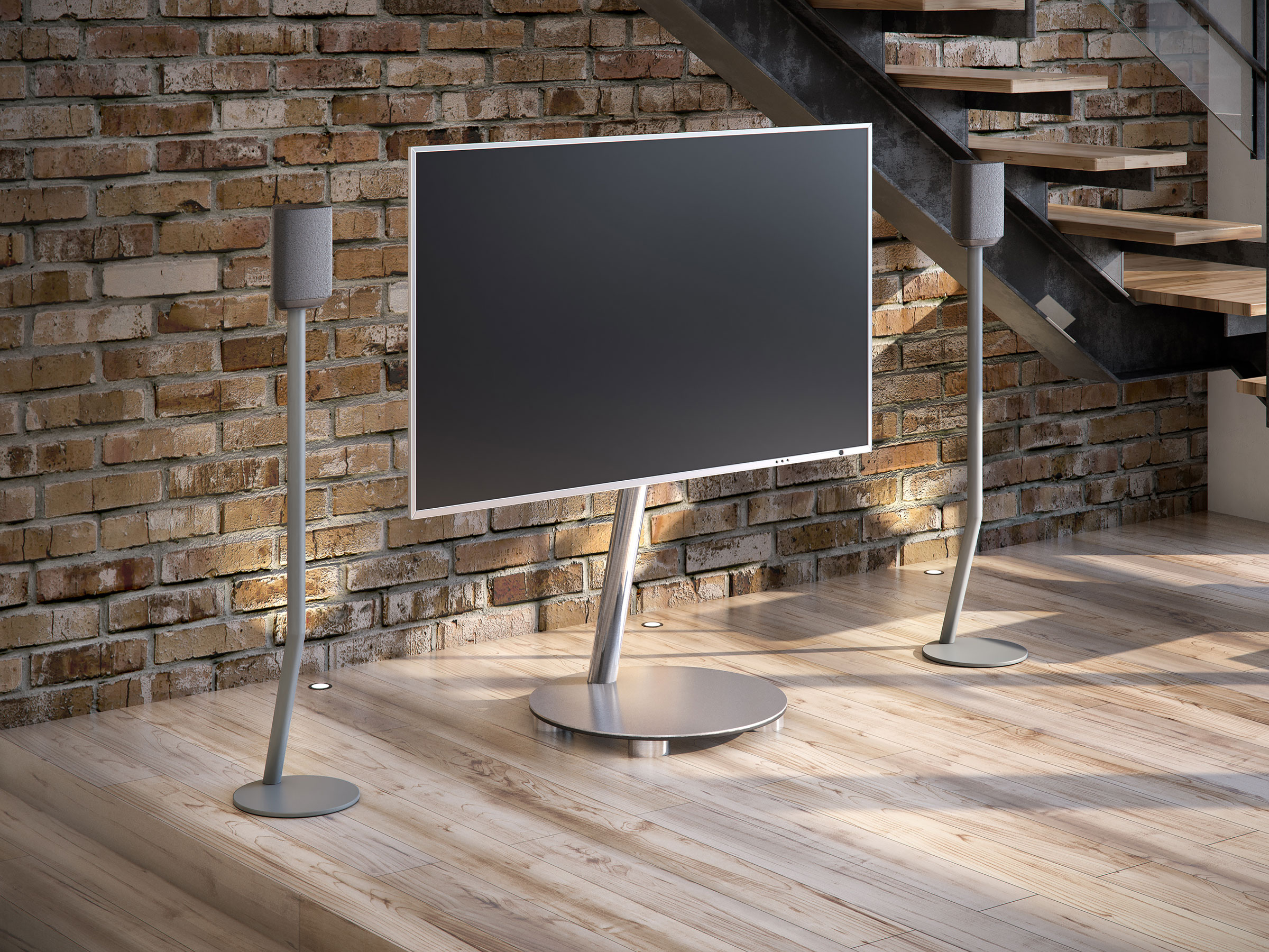 Ein modernes TV-Setup mit großem Bildschirm und zwei Lautsprechern auf Ständern.