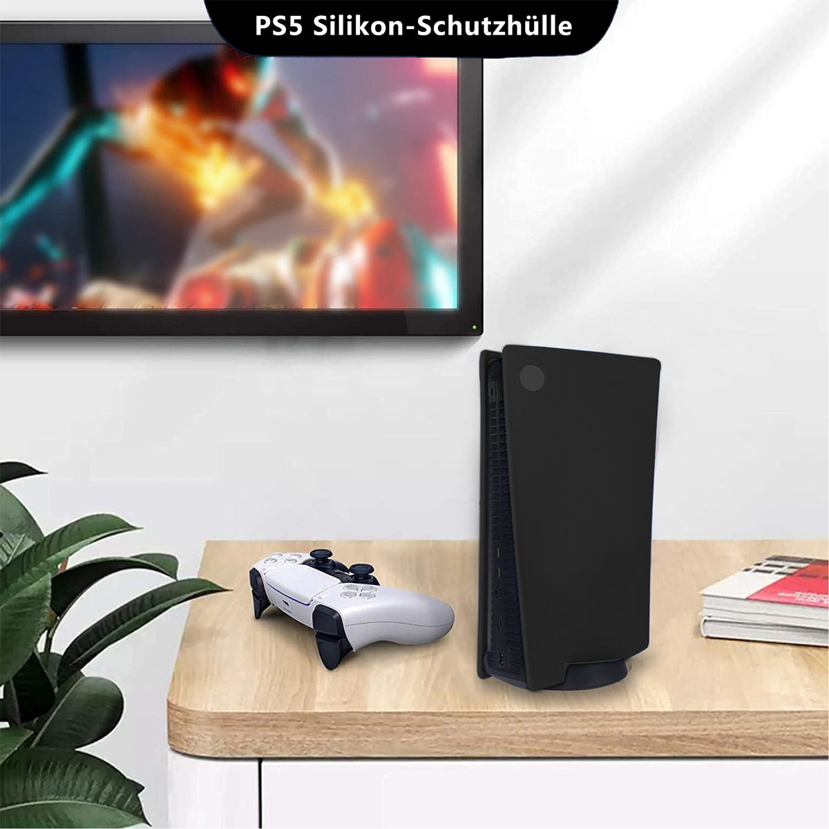 PS5-Konsole und Controller auf einem Tisch, mit Bildschirm dahinter.