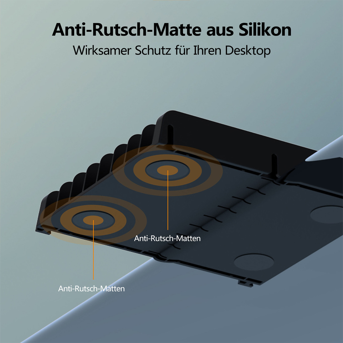 Schwarze Anti-Rutsch-Matte. Zwei orangefarbene Kreise zeigen die Anti-Rutsch-Eigenschaften. Grauer und weißer Hintergrund.
