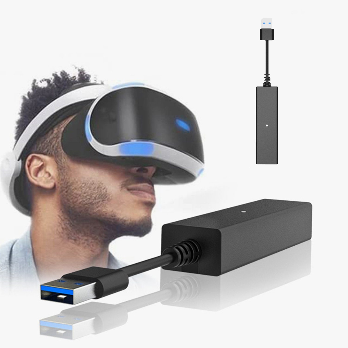 Mann mit VR-Headset und USB-Adapter daneben.