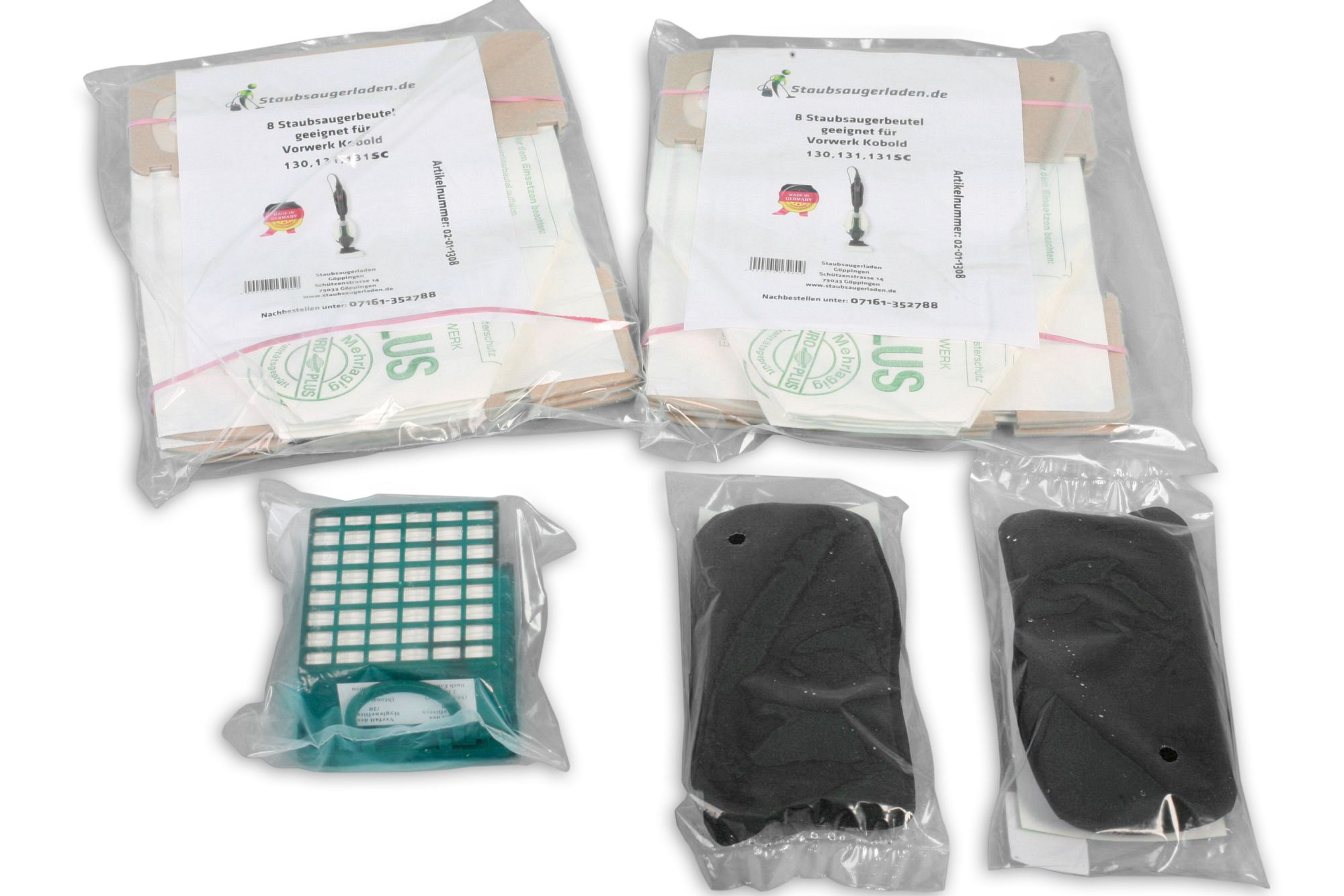 Staubsaugerbeutel und Filter in transparenter Verpackung. Verschiedene Formen und Größen sind sichtbar.