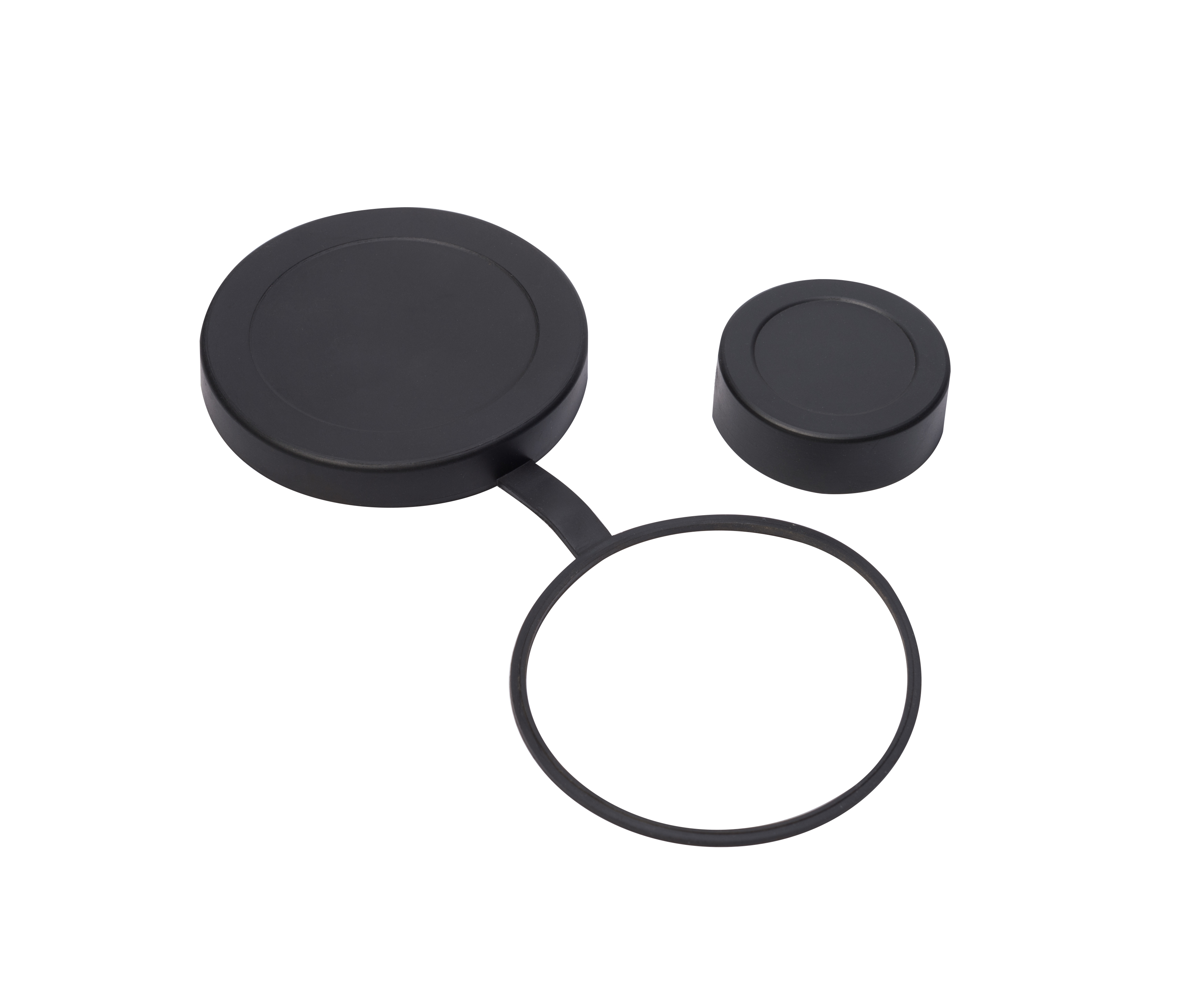 Zwei schwarze Objektivdeckel mit einem Ring auf weißem Untergrund.