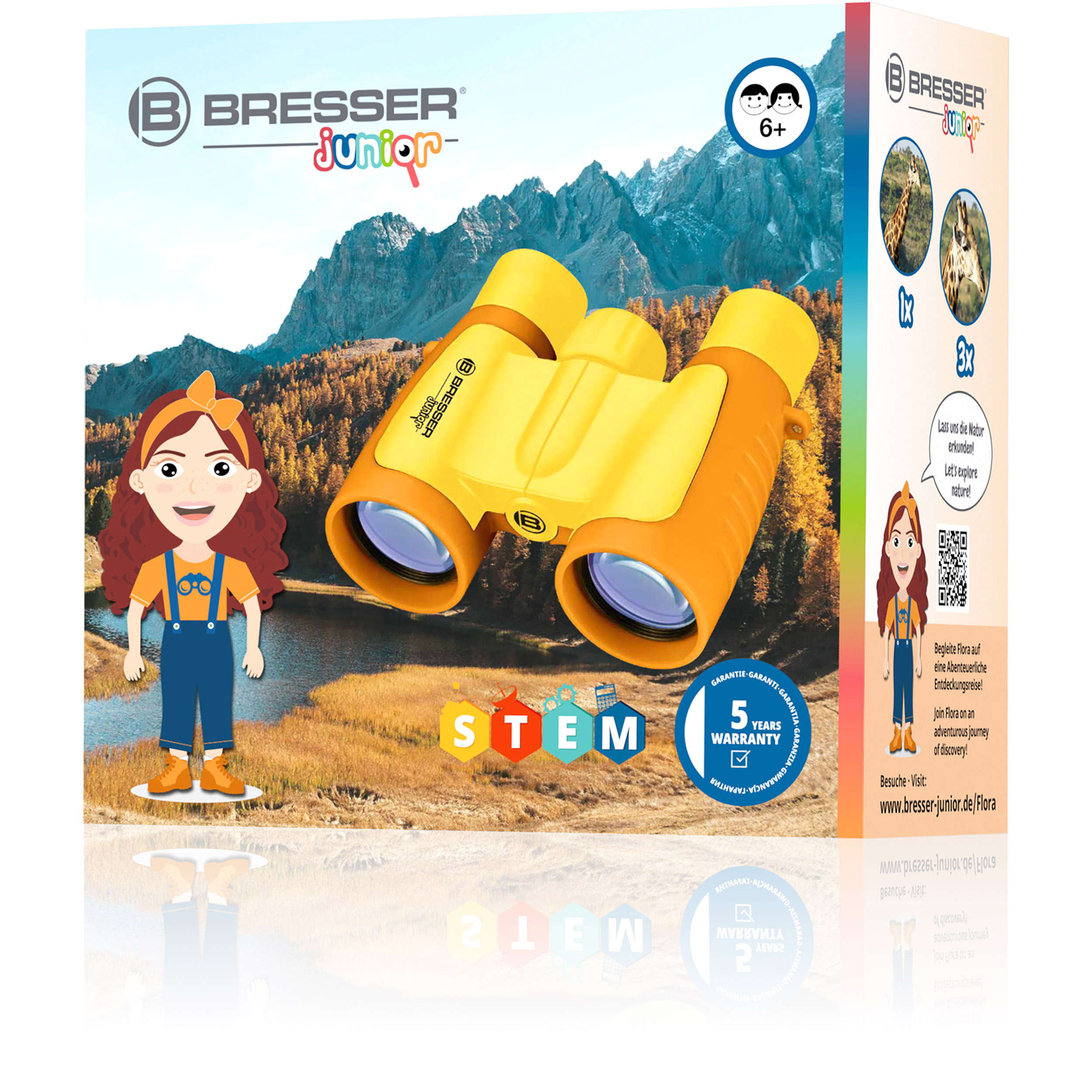 Gelb-orangefarbenes Fernglas in einer Box mit Illustrationen und Text. Ein Mädchen ist auf der Box.