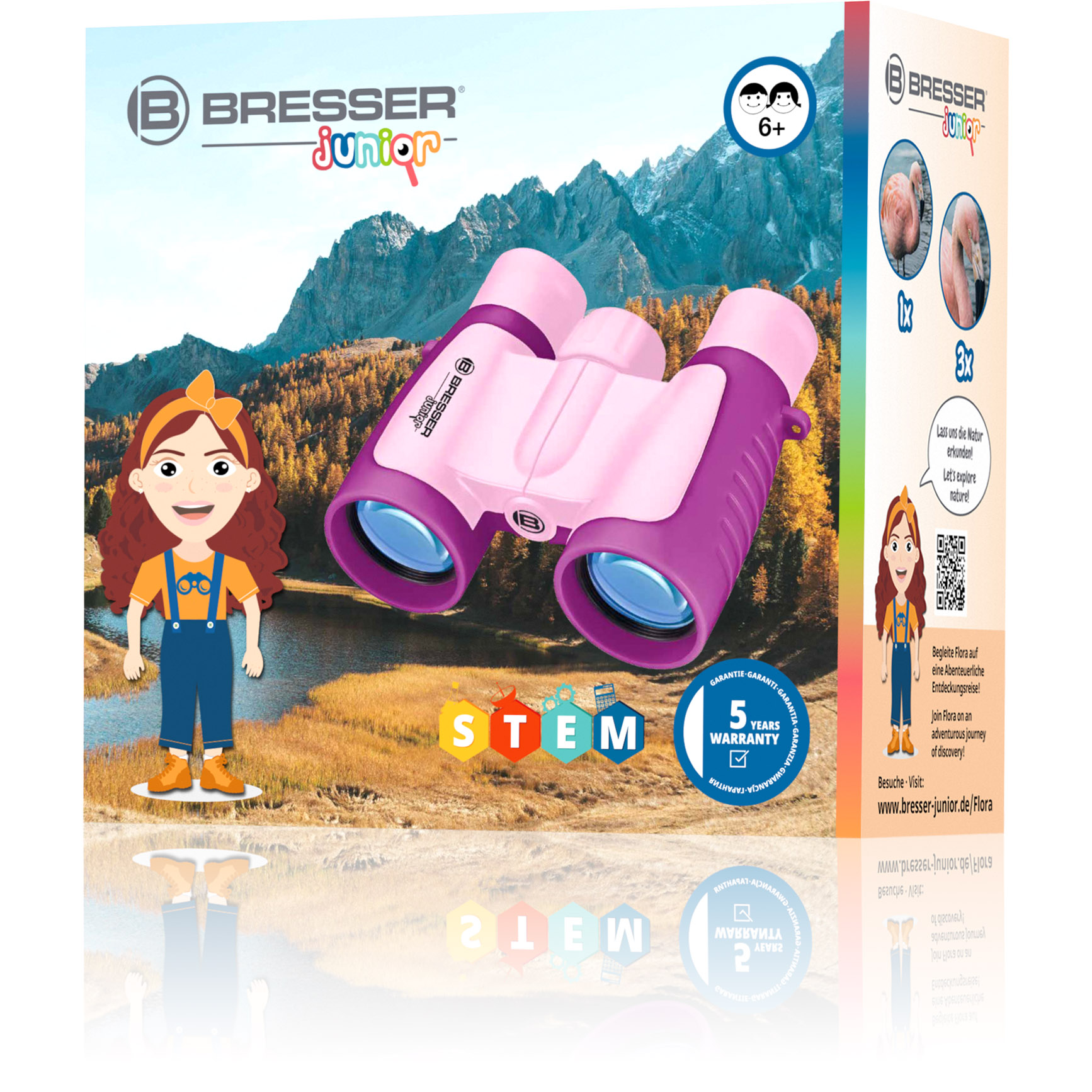 Eine Schachtel mit rosa und lila Ferngläsern, einer Mädchenillustration und einer Berglandschaft im Hintergrund.