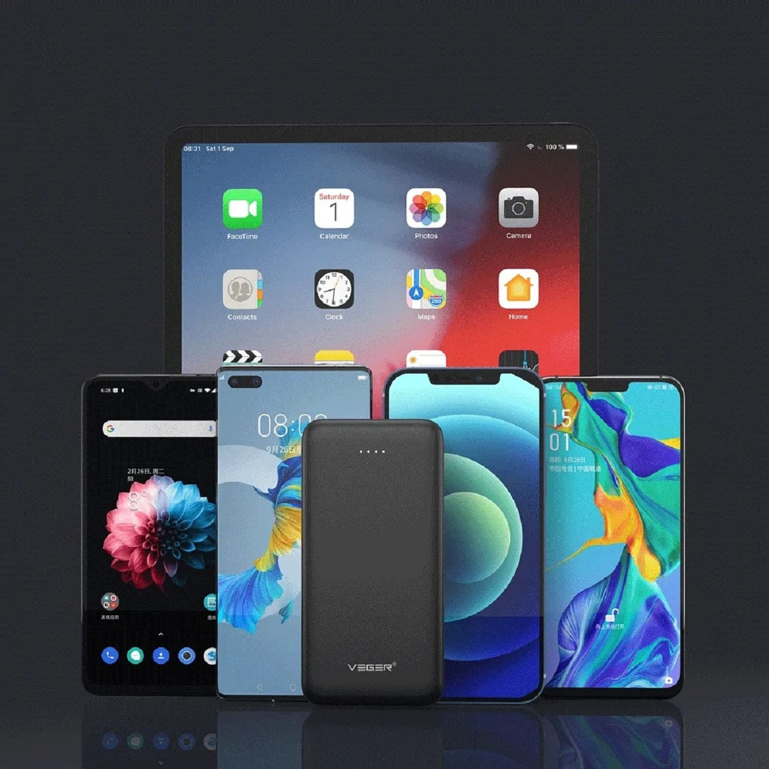 Ein Tablet und mehrere Telefone, mit einer schwarzen Powerbank in der Mitte.