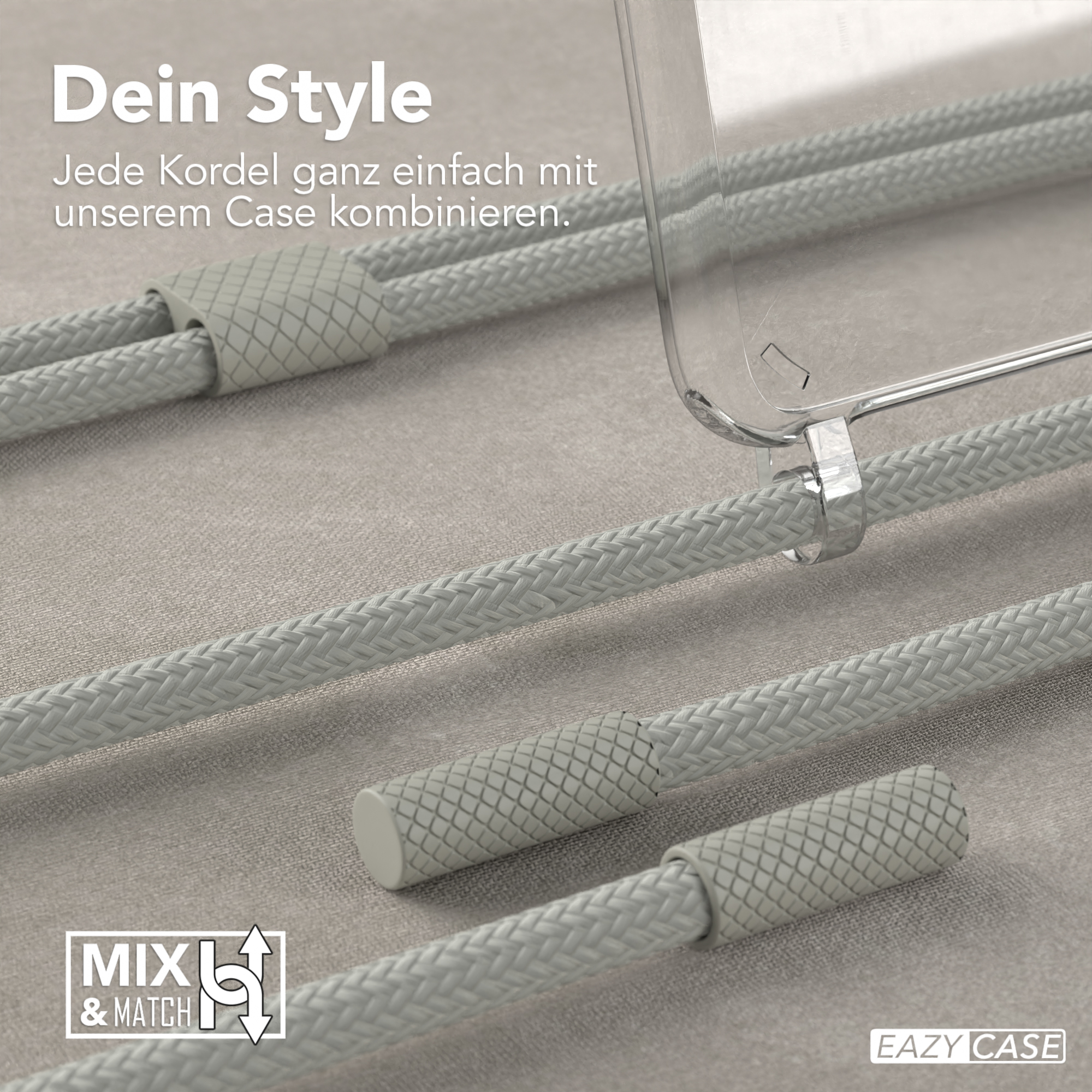 Nahaufnahme von grauen Telefonkabeln mit einer Handyhülle. Die Kabel sind geflochten und strukturiert.