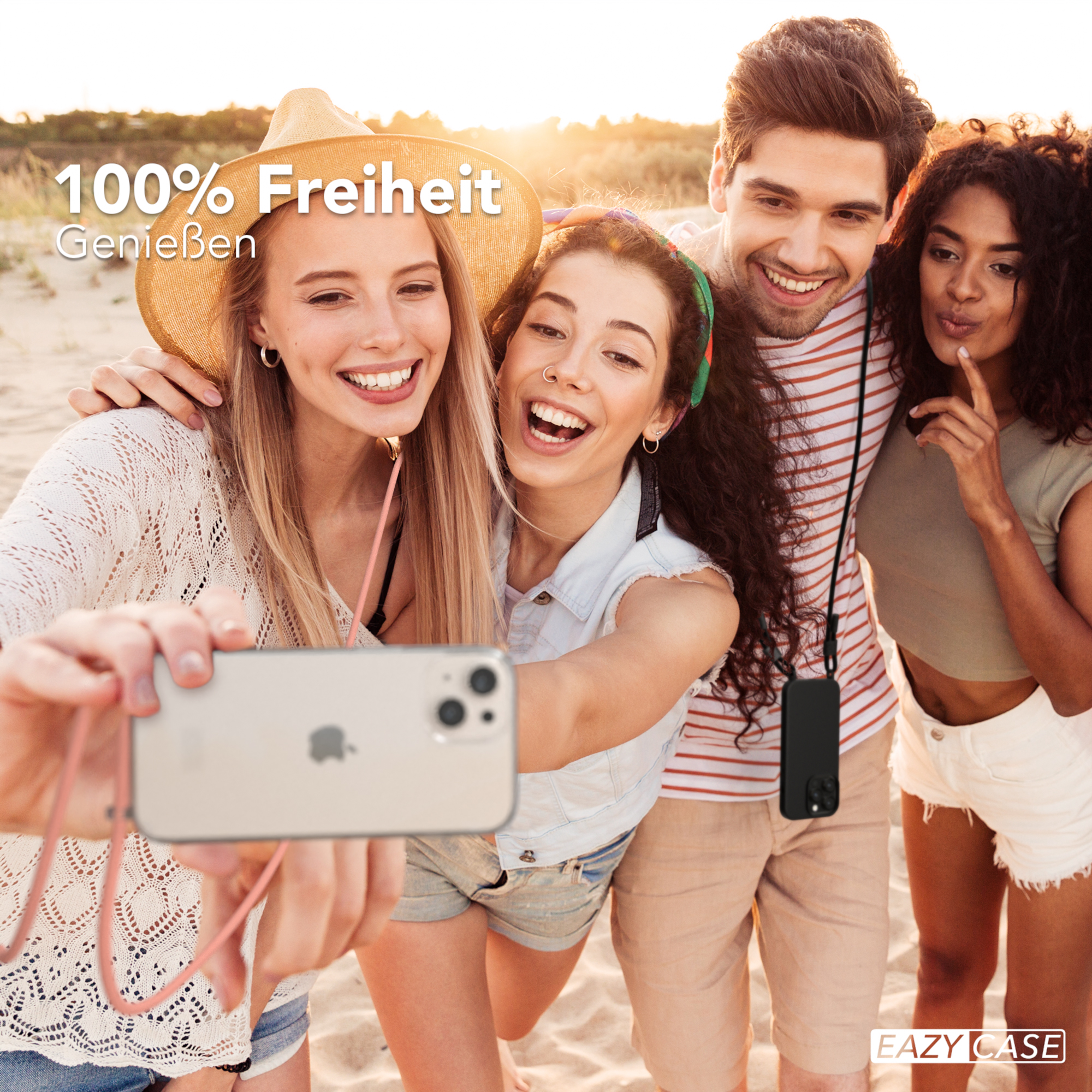 Freunde am Strand machen ein Selfie. Enthält ein Telefon und ein Lanyard.