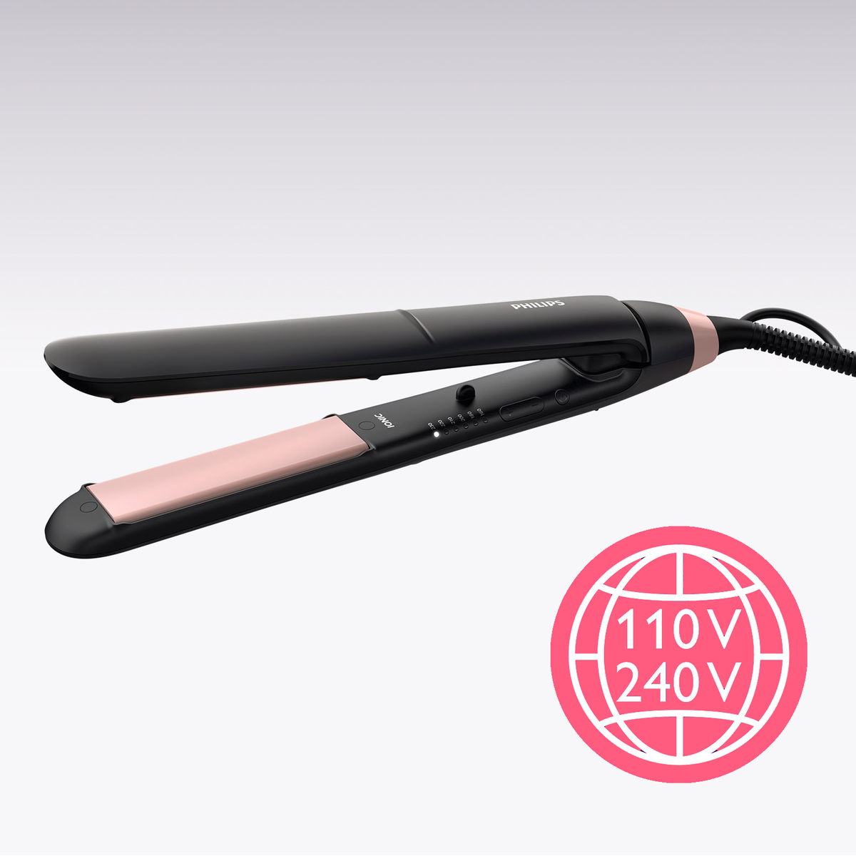 Czarna prostownica Philips z różowymi płytkami. Czerwona etykieta 110V/240V.