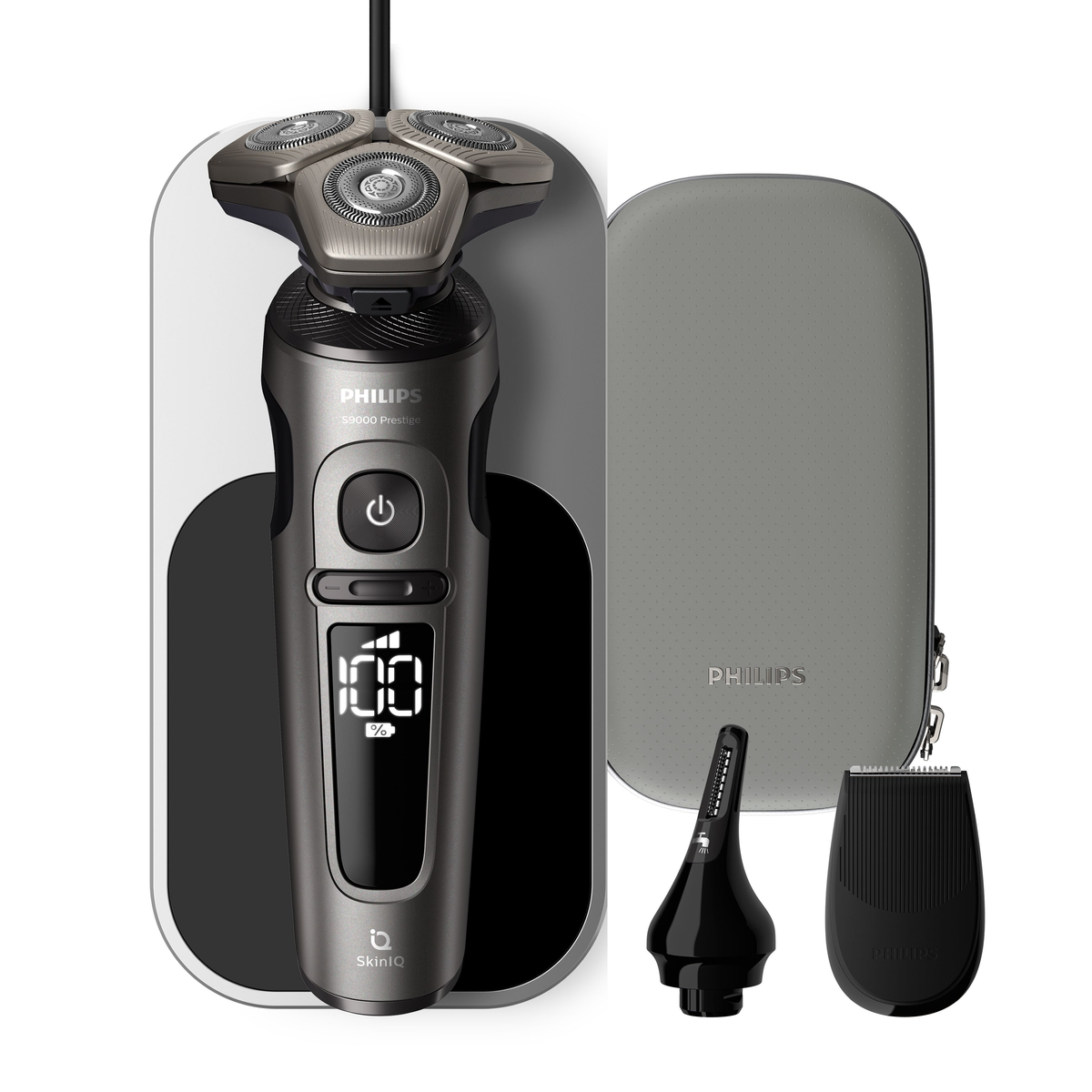 Afeitadora eléctrica Philips, base de carga y accesorios sobre fondo blanco.