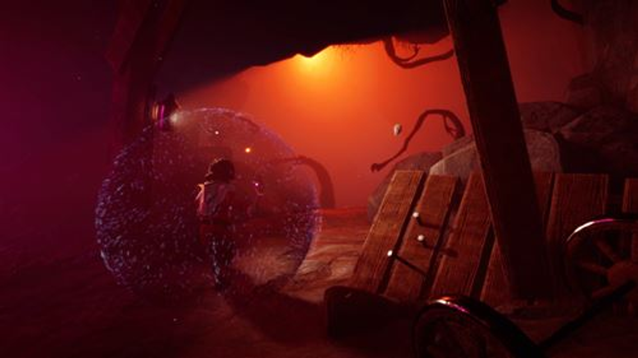 Una scena all'interno di una grotta con una persona in una bolla. Tavole di legno e un bagliore arancione.