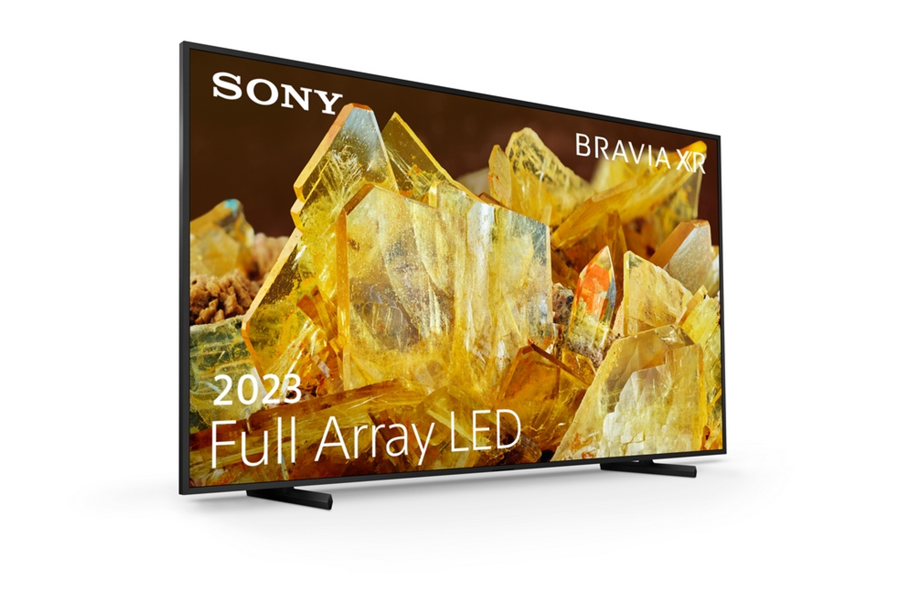 Ein Flachbildfernseher mit goldenem, kristallinem Design auf weißem Hintergrund.