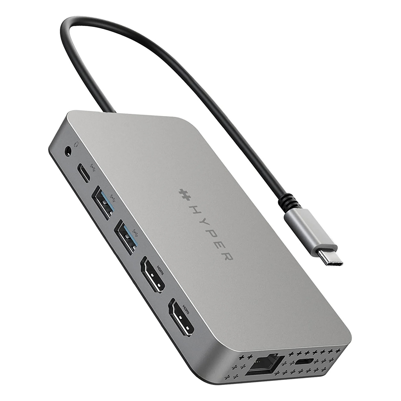 Un concentrador plateado con varios puertos y un cable negro sobre un fondo blanco.