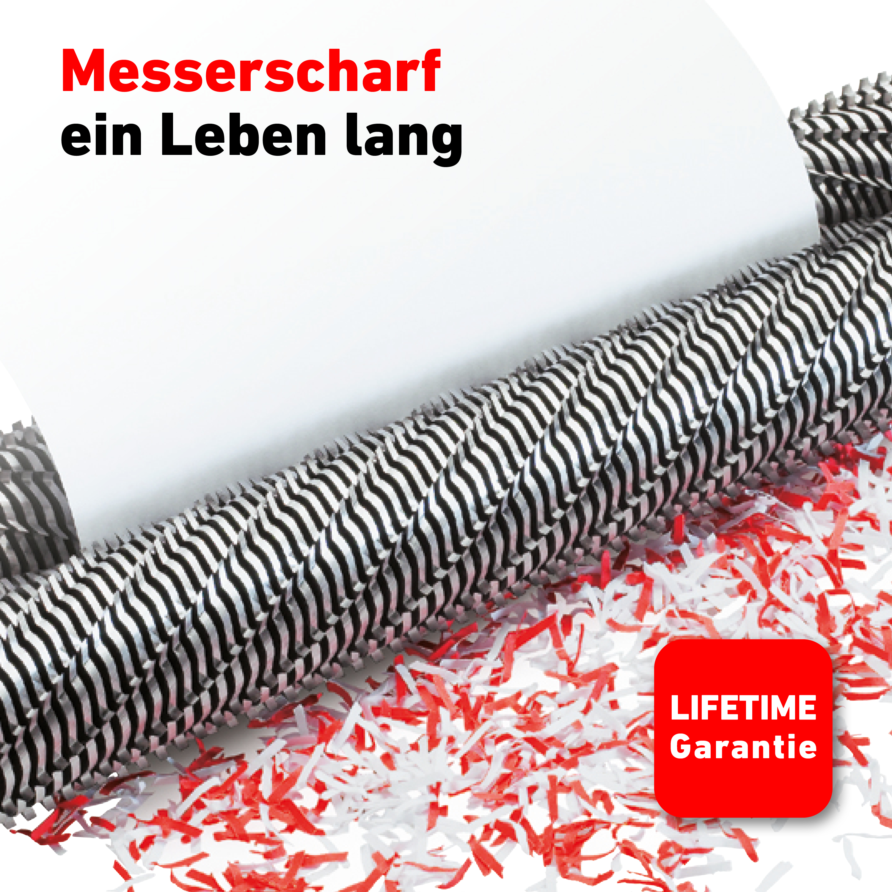Ein Aktenvernichter, der Papier zerkleinert, dabei entstehen rote und weiße Streifen.