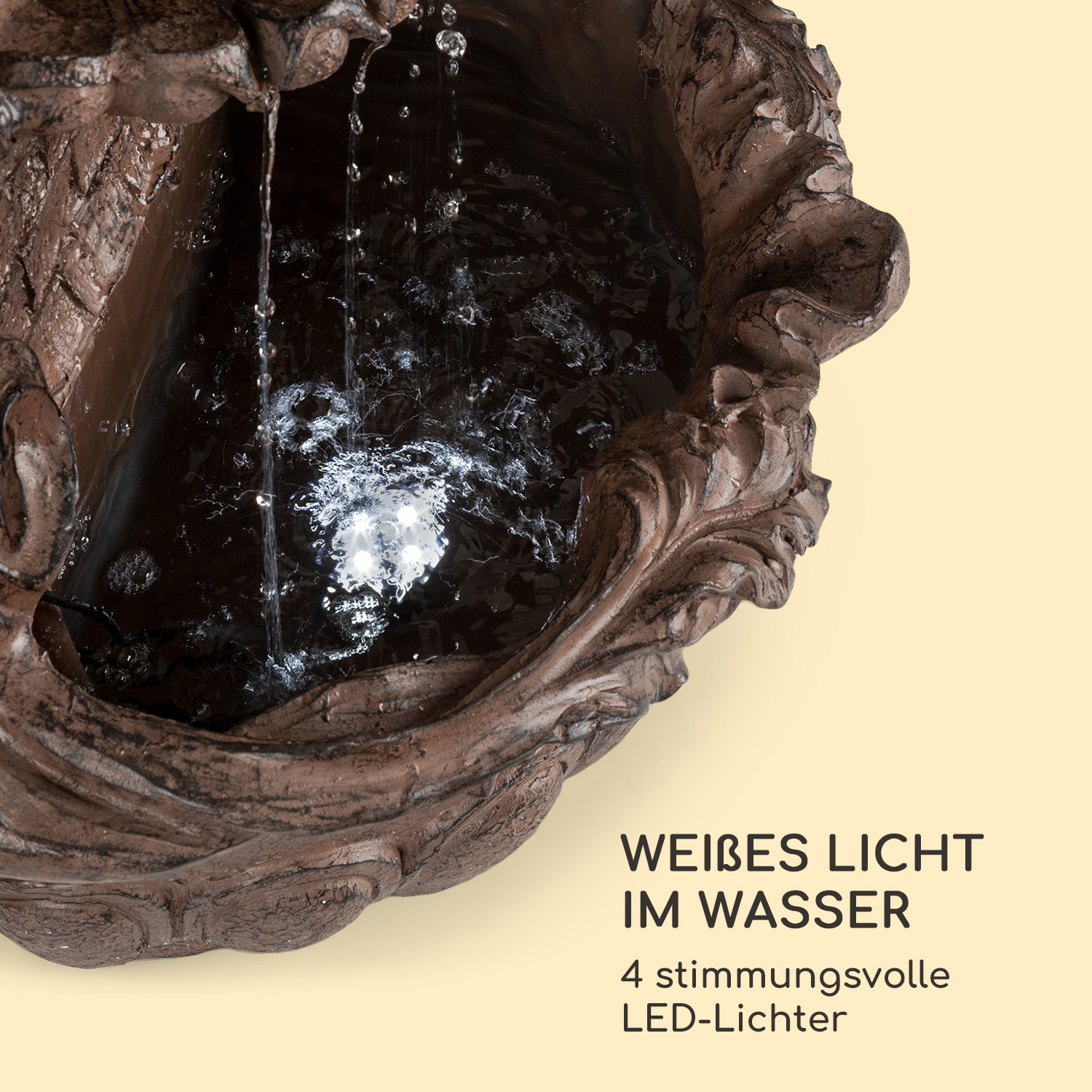 Una fuente marrón con agua y una luz LED blanca, con el texto 'WEISSES LICHT IM WASSER'.