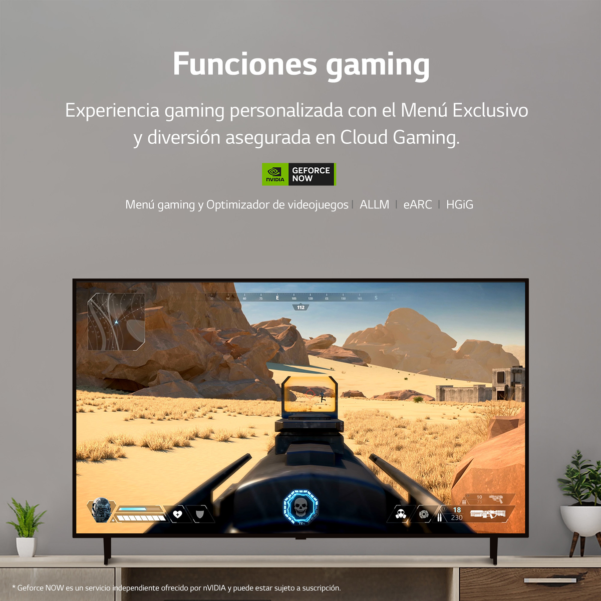 Ekran telewizora wyświetlający grę z celownikiem, piaszczystym krajobrazem i tekstem.