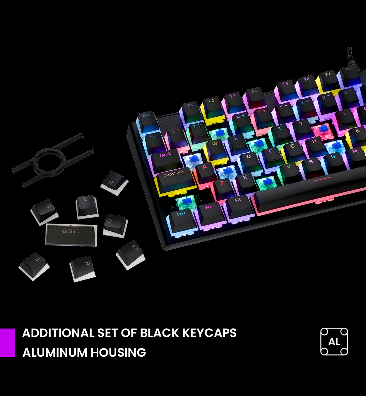 Un teclado con teclas negras adicionales y un extractor de teclas.