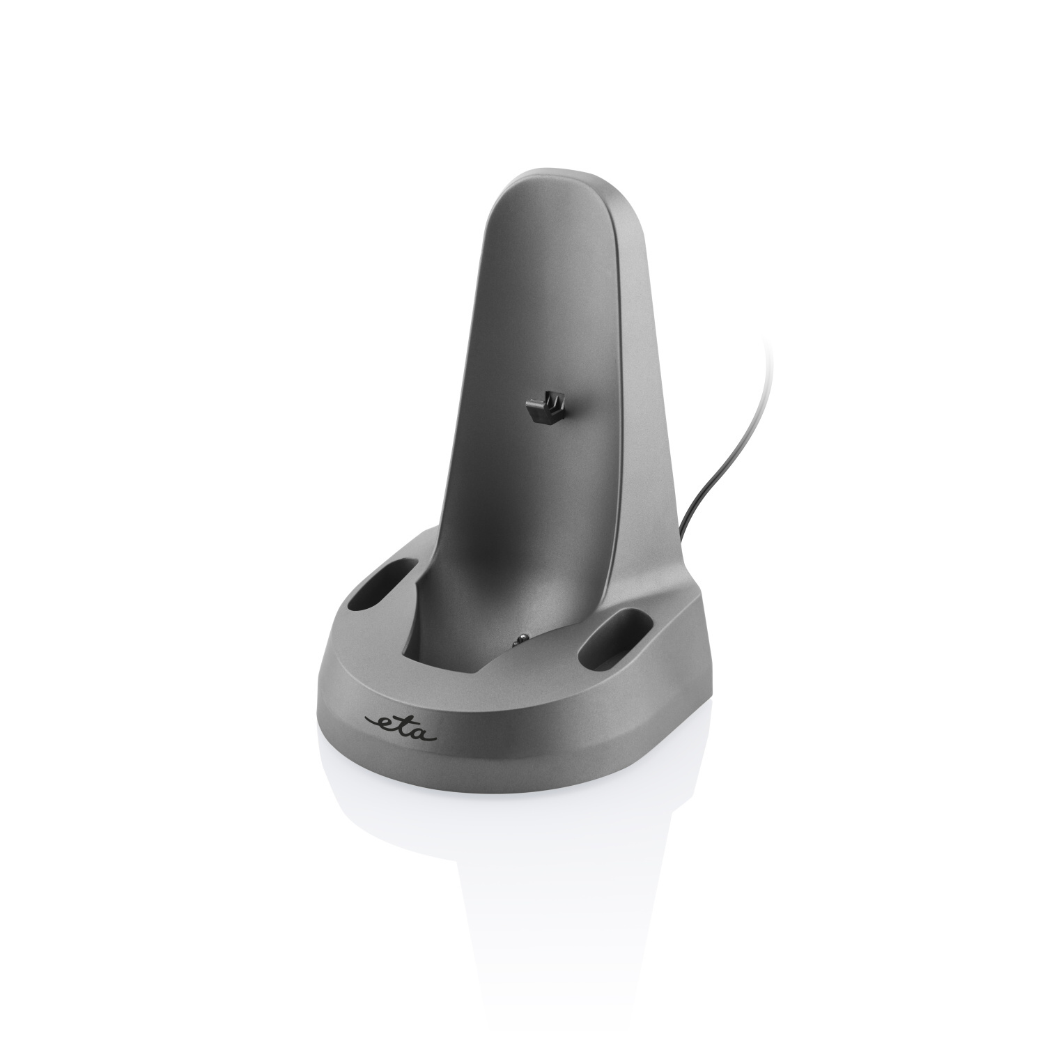 Eine graue Ladestation für ein Gerät, mit zwei Löchern und einem Netzkabel.