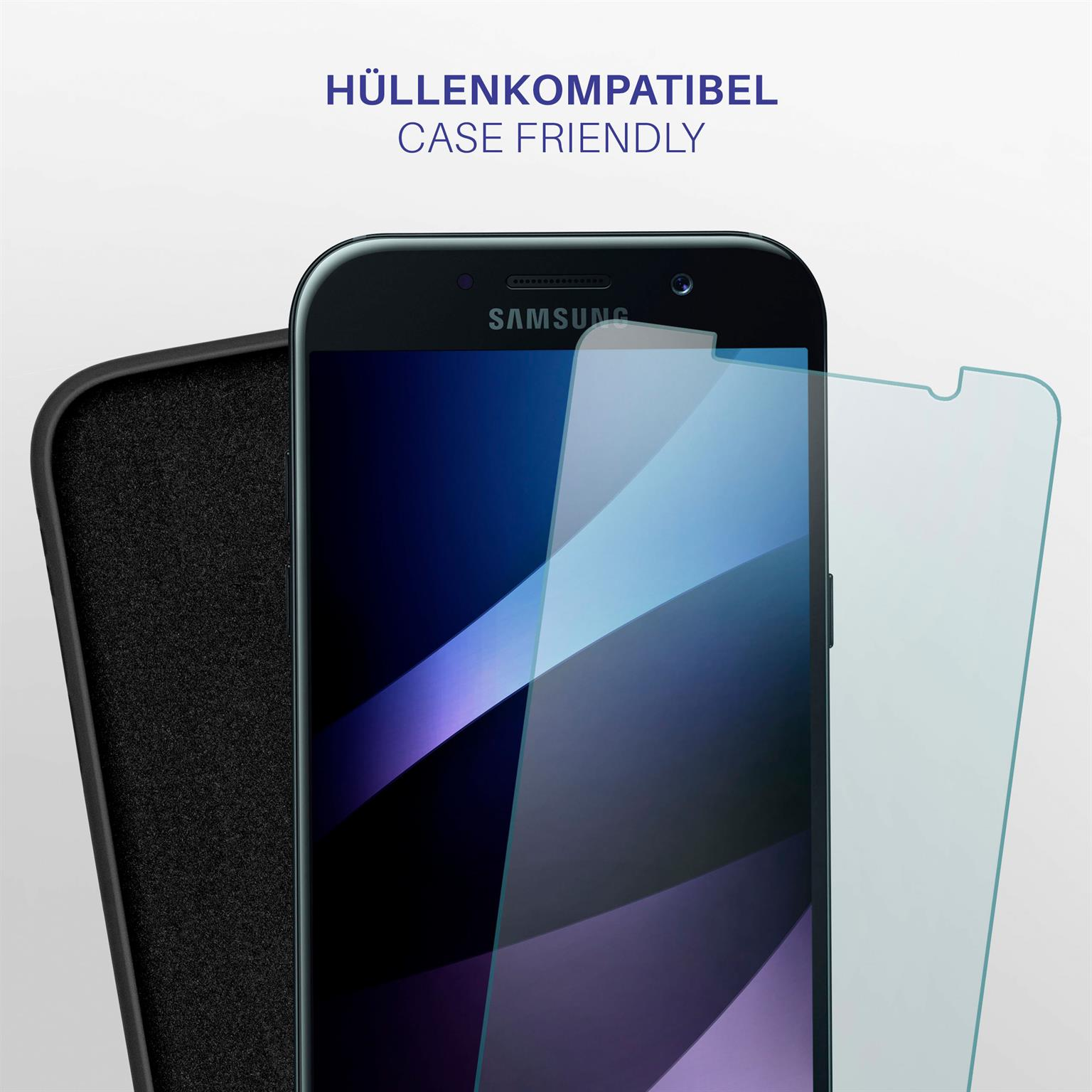 Smartphone mit Displayschutz und Hülle. Text: 'Hüllenkompatibel'. Blau-weißer Hintergrund.
