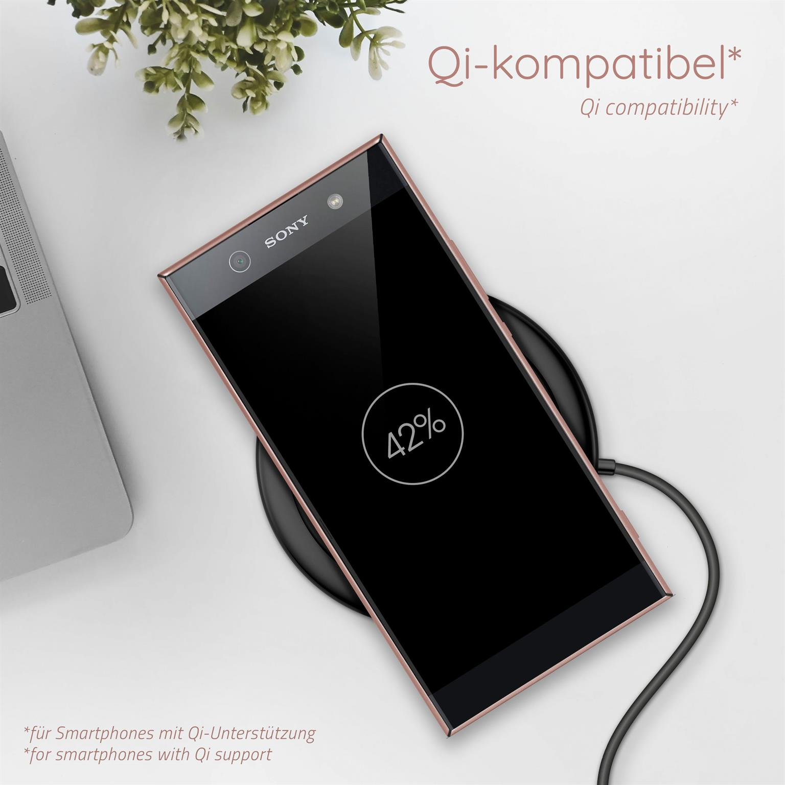 Ein Telefon auf einem kabellosen Ladegerät. Das Telefon zeigt 42% Akku. Text sagt 'Qi-kompatibel'.