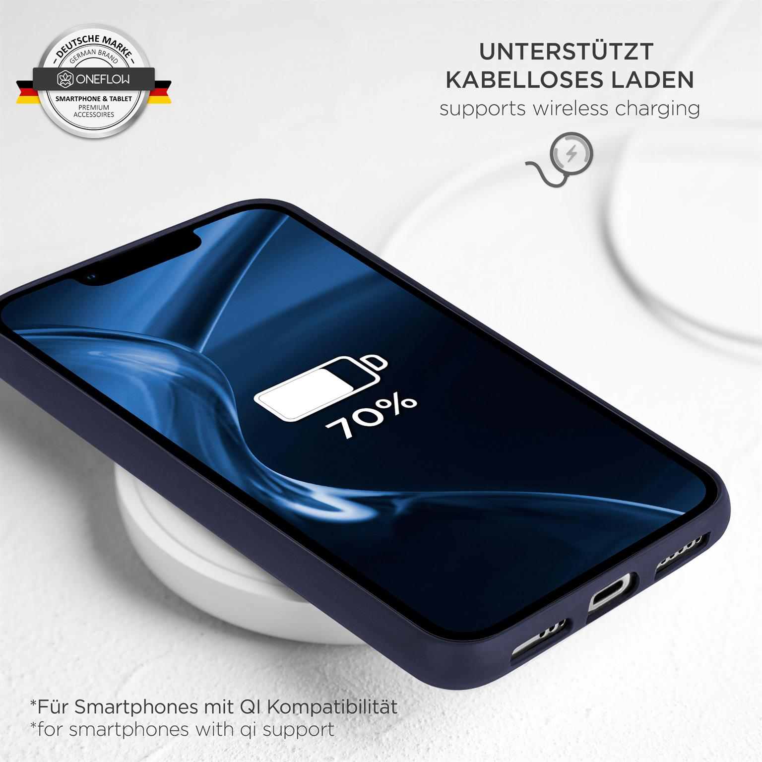 Dunkelblaues Telefon auf einem kabellosen Ladegerät, zeigt 70% Akku.