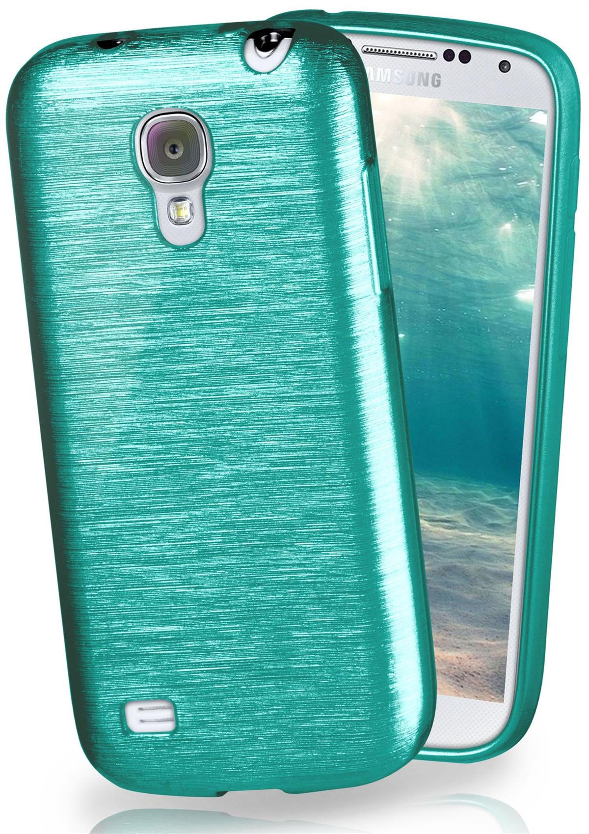 Eine türkisfarbene Handyhülle mit einem Telefon darin. Das Telefon ist weiß und hat eine Kamera. Die Hülle hat eine strukturierte Oberfläche.