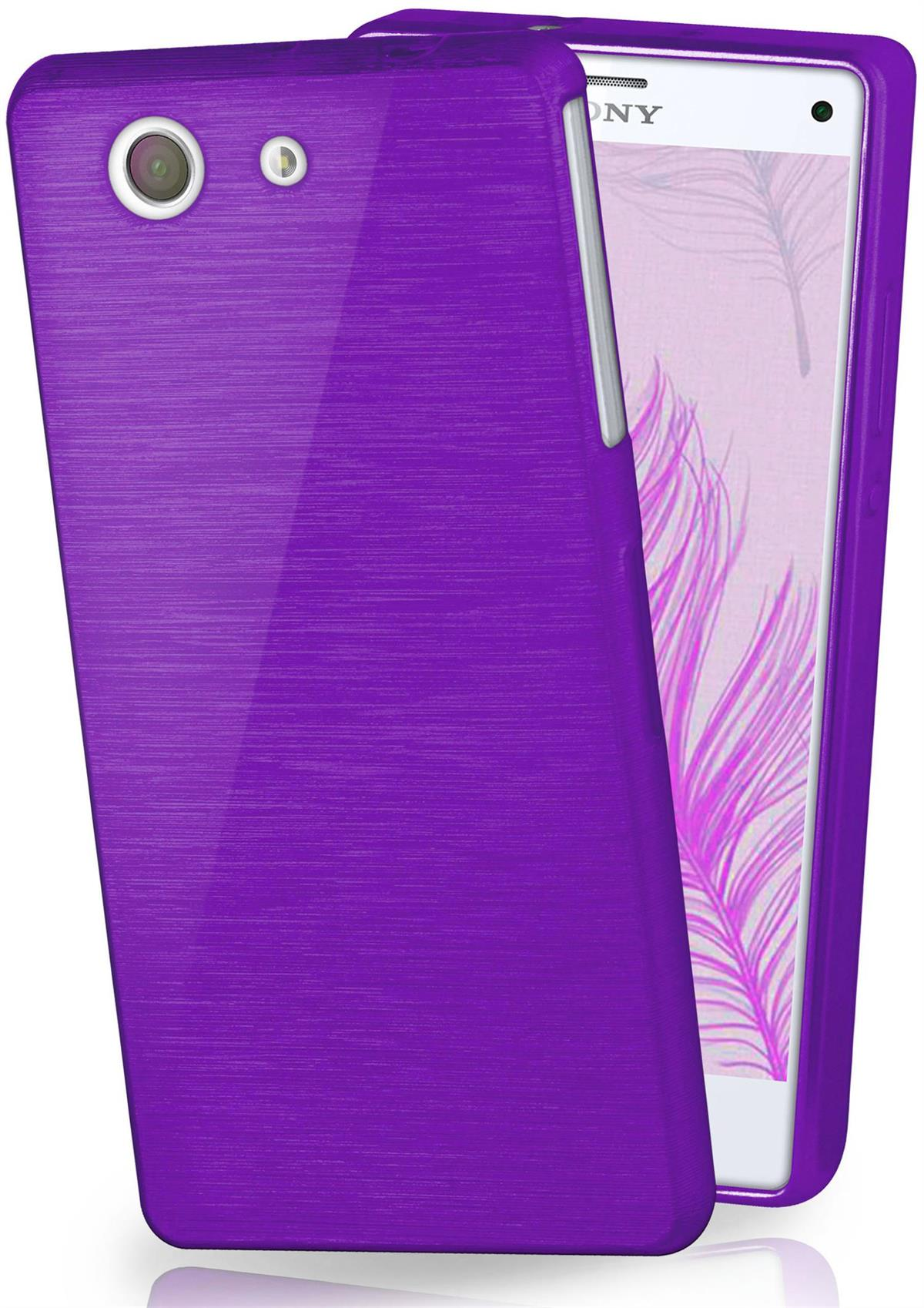 Eine lila Handyhülle mit einem Smartphone darin. Die Hülle hat eine gebürstete Metallstruktur.