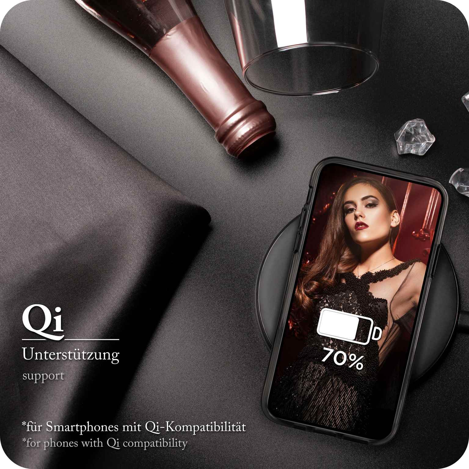 Telefon auf Ladegerät mit Frauenbild auf dem Bildschirm, Flasche und Glas im Hintergrund.