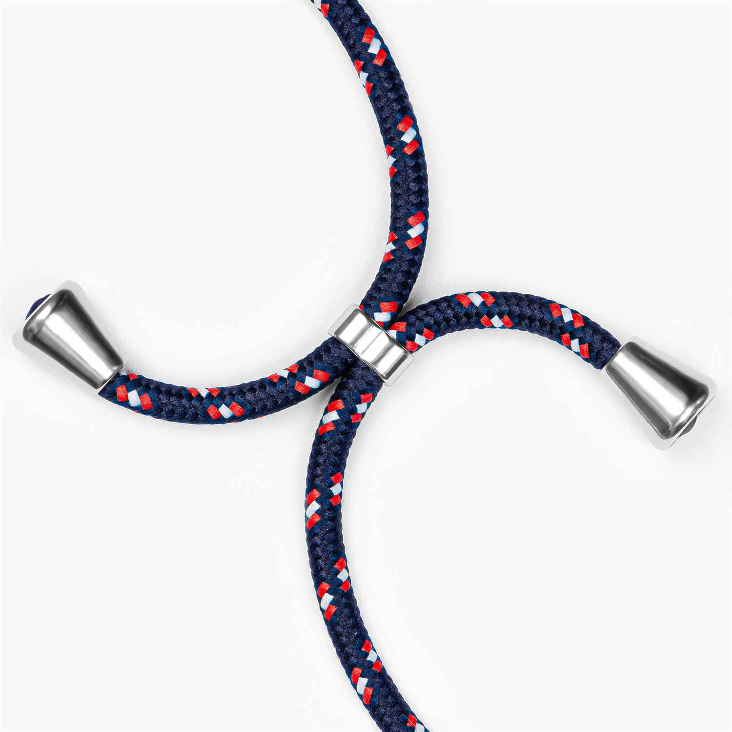 Blaues, rotes und weißes Telefon-Lanyard mit silbernen Spitzen. Es bildet eine Kreuzform auf weißem Grund.