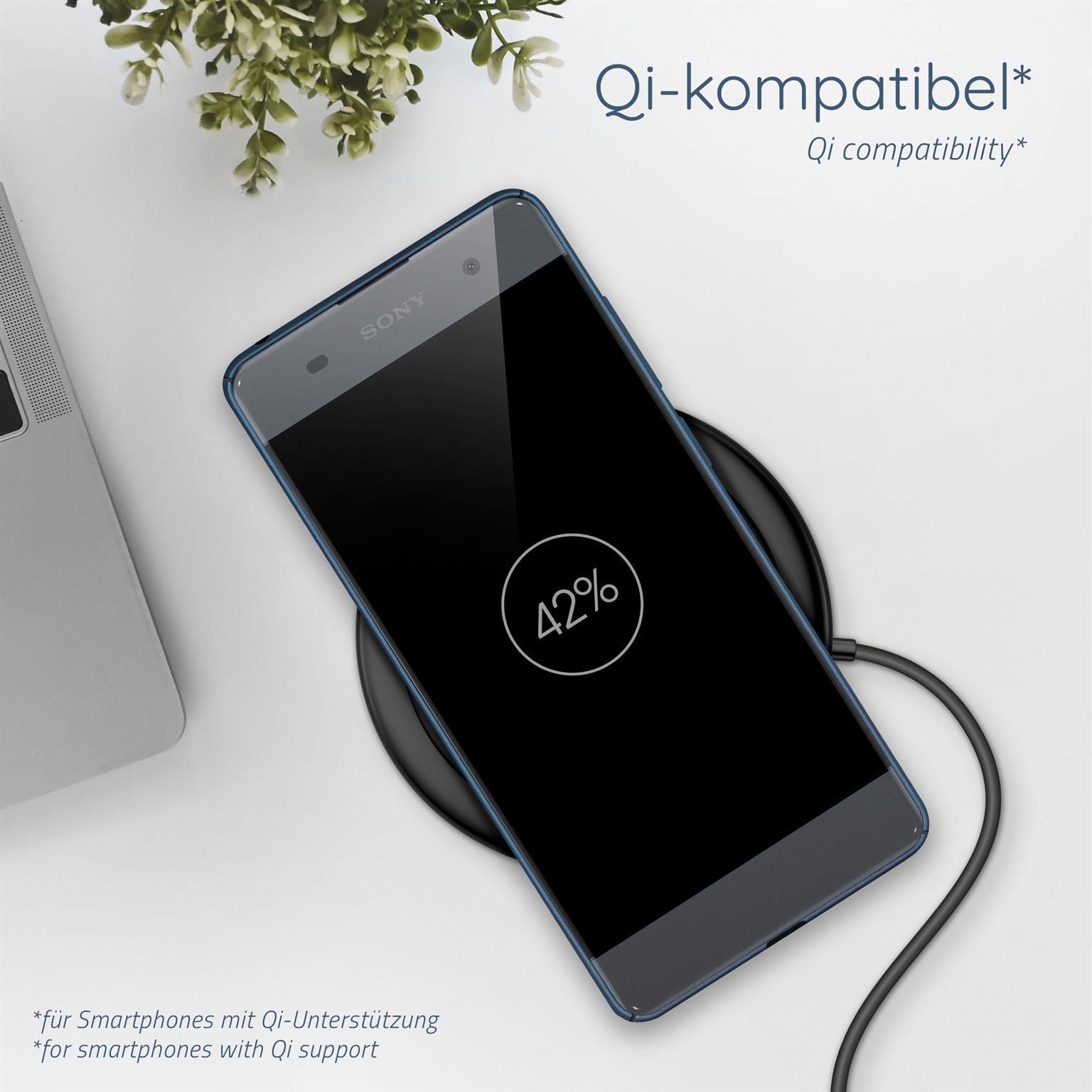 Ein Smartphone lädt auf einem kabellosen Ladegerät, der Bildschirm zeigt 42%.
