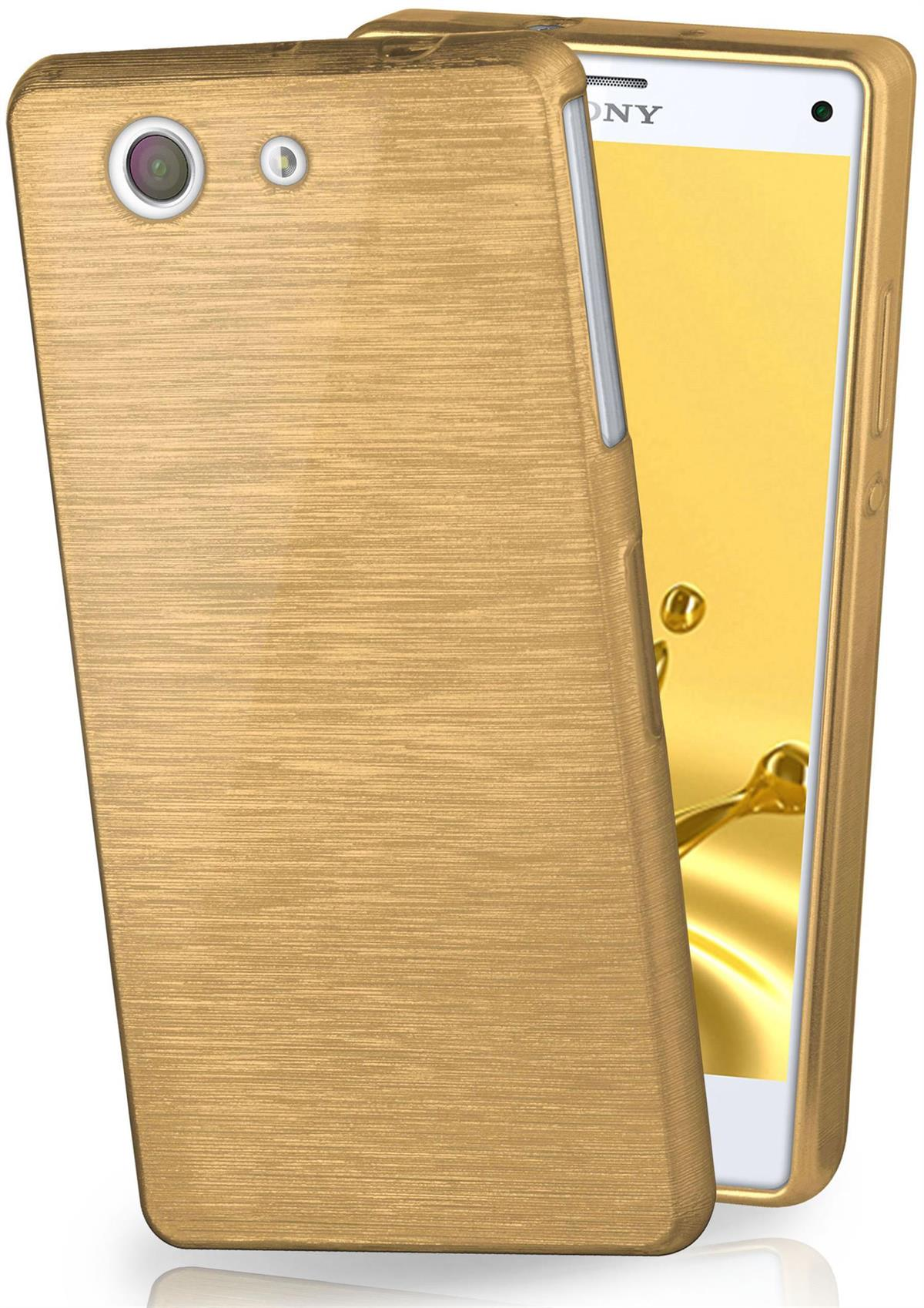 Goldfarbene Handyhülle. Weißer Hintergrund.