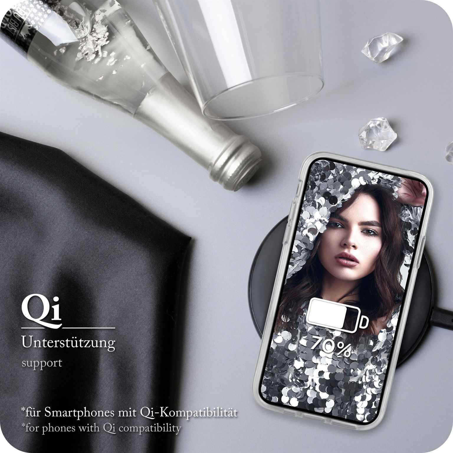 Handyhülle mit Frauenbild, lädt. Champagnerflasche und Glas daneben.