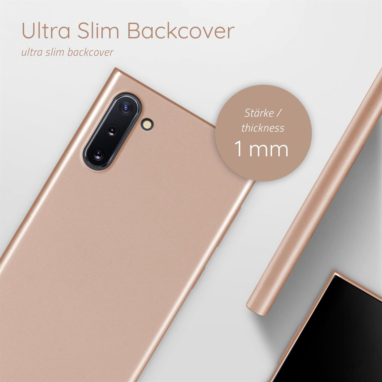 Handy-Rückseite in Roségold. Die Dicke beträgt 1 mm. Im Hintergrund eine Telefonecke.