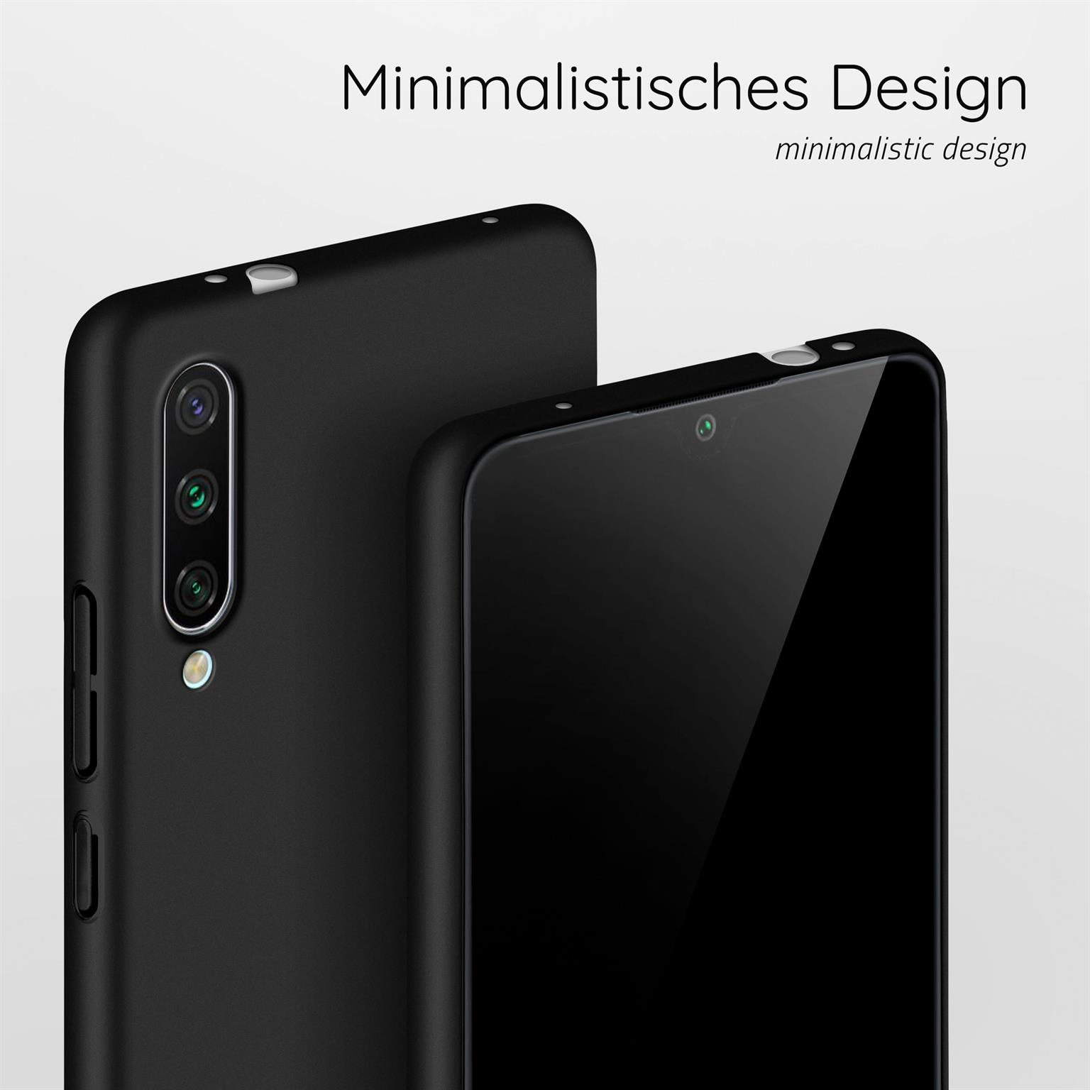 Zwei schwarze Telefone, eines im Fokus. Das Telefon im Hintergrund ist leicht unscharf.