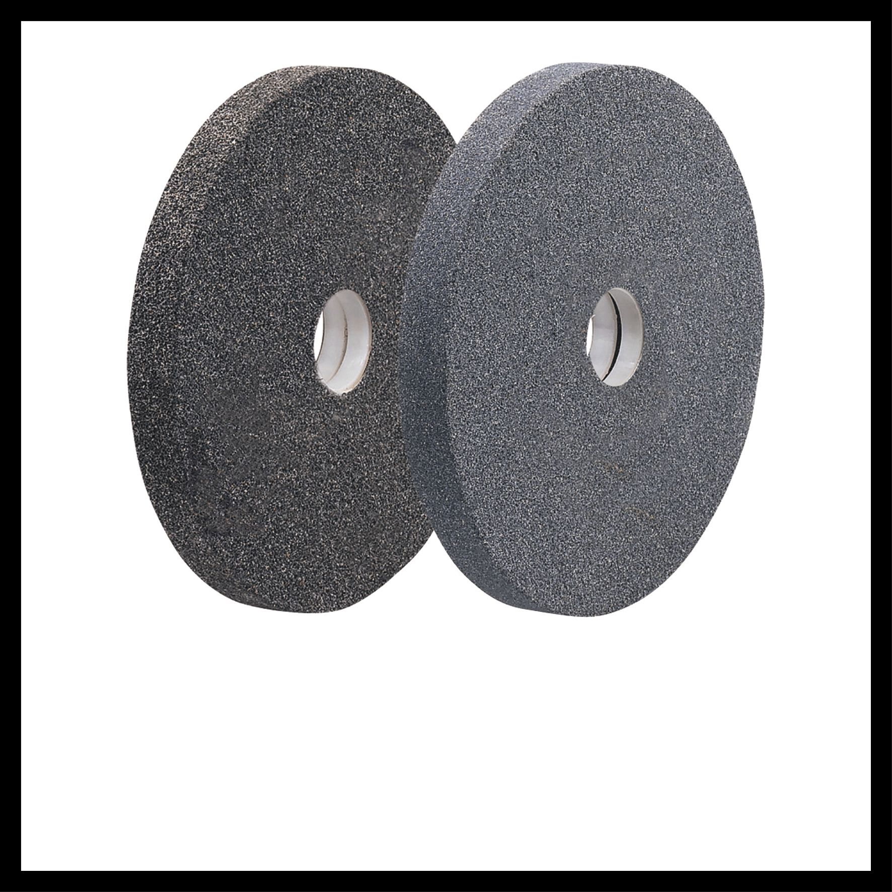 Dwa szare ściernice z białymi środkami na białym tle. Są obok siebie.