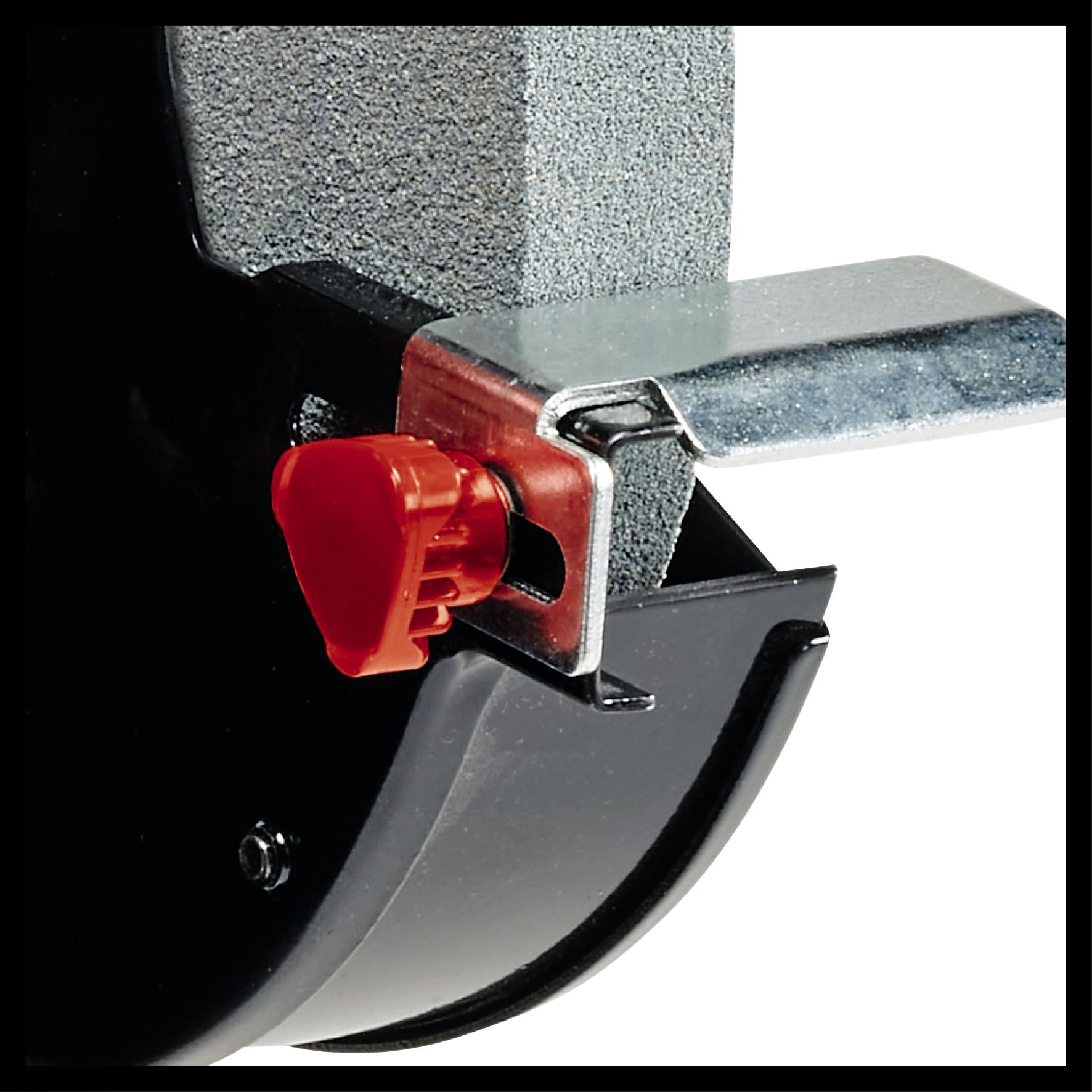 Zbliżenie ściernicy z czerwonym pokrętłem i czarnymi metalowymi częściami.