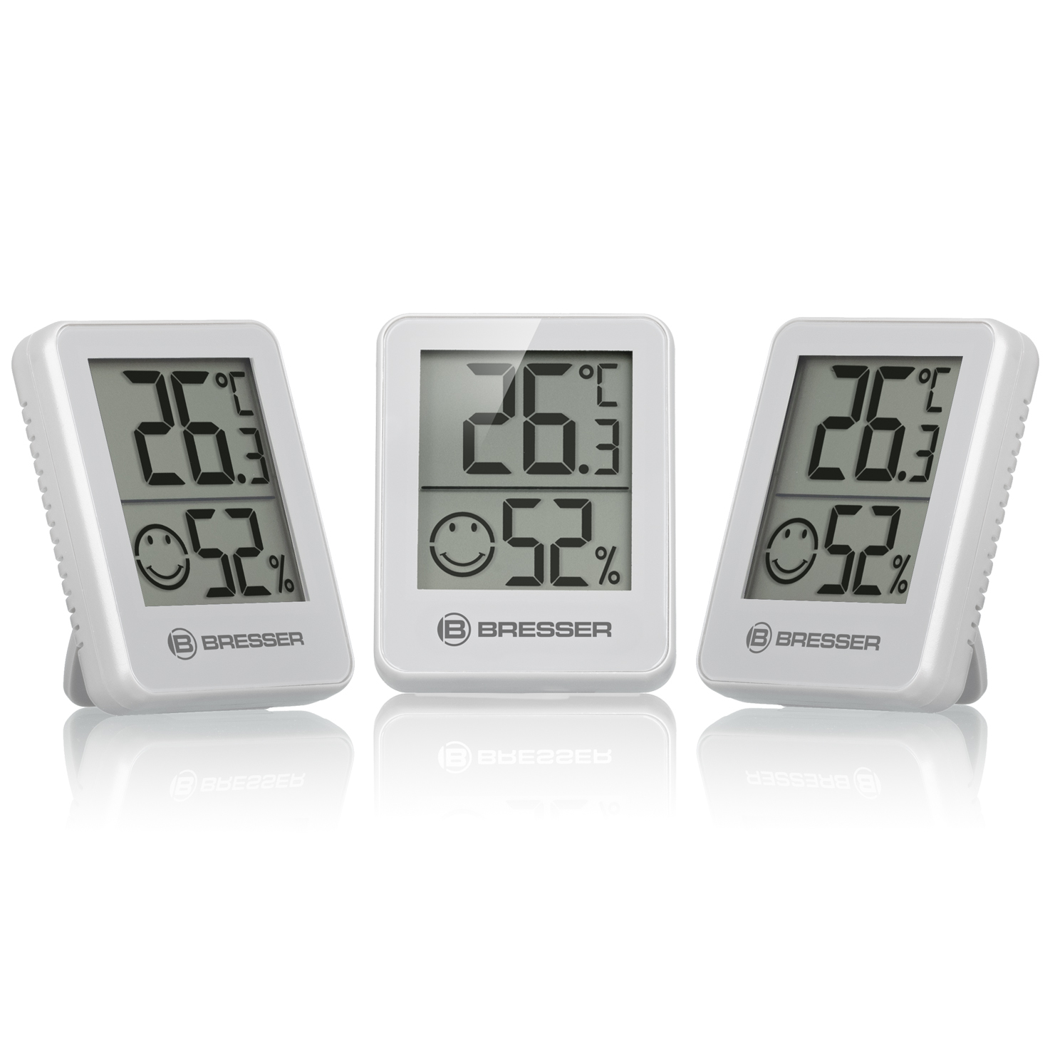 Tres termómetros digitales blancos con visualización de temperatura, humedad y una carita sonriente.