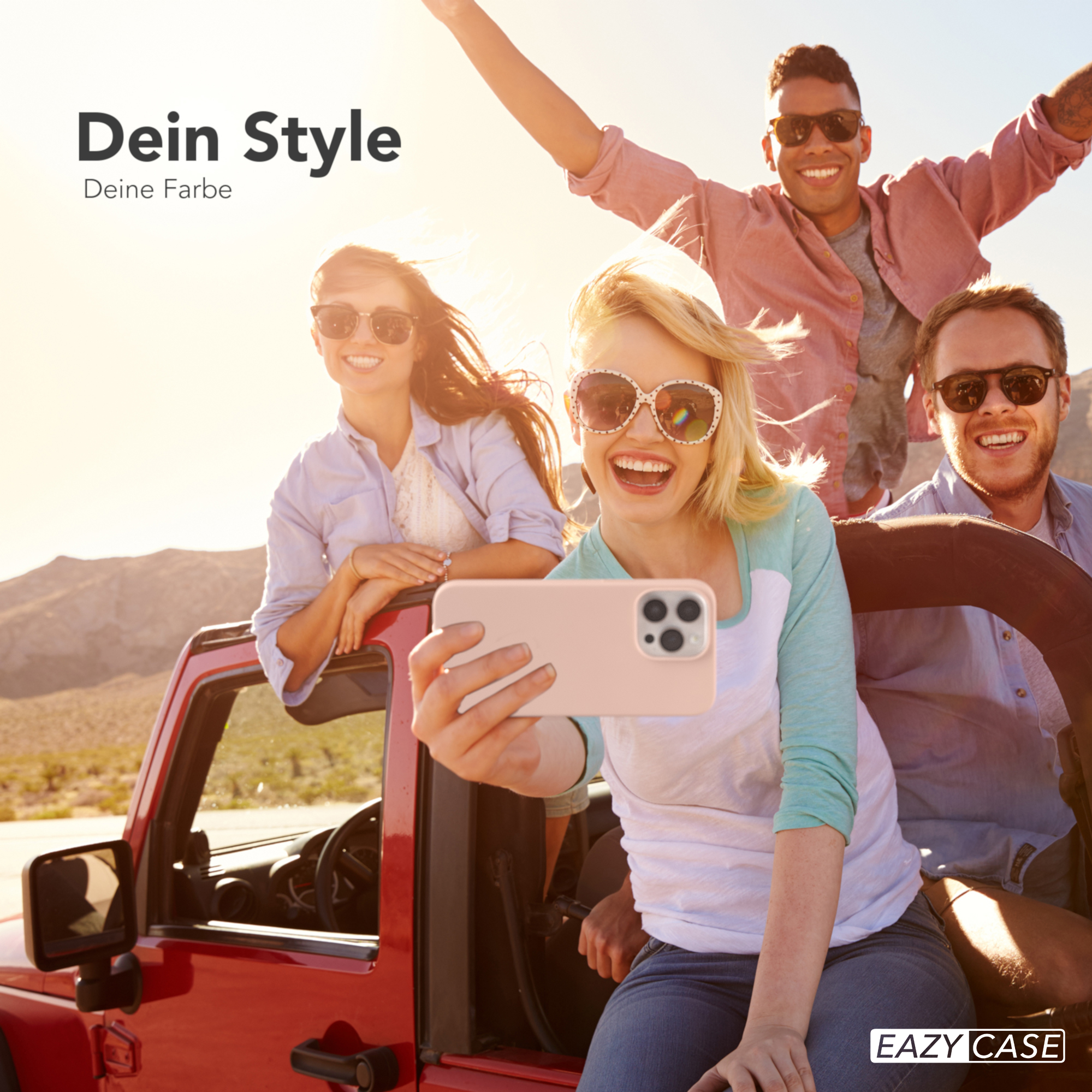 Vier Personen machen ein Selfie in einem roten Jeep. Einer hält ein beiges Telefon in einer Hülle.