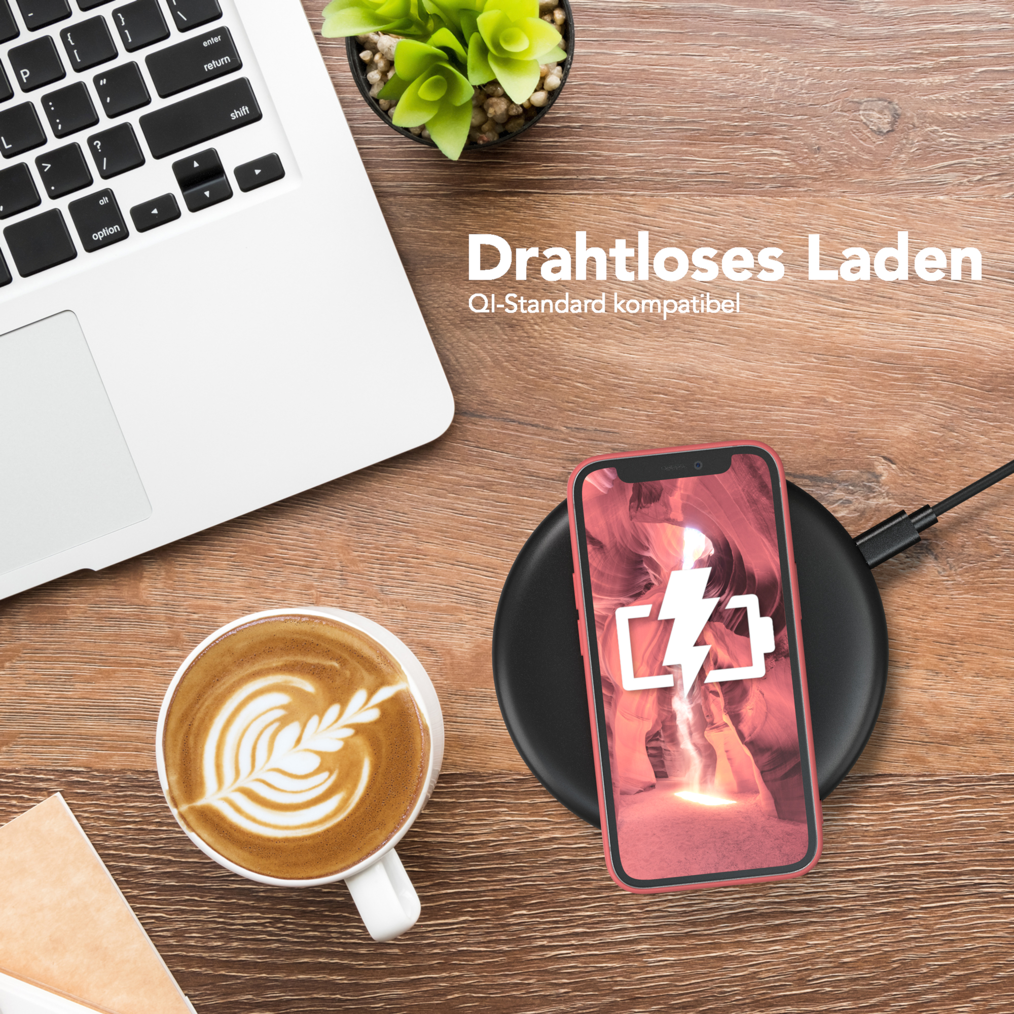 Ein Telefon, das drahtlos neben einem Kaffee und einem Laptop aufgeladen wird. Der Text lautet „Kabelloses Laden“.