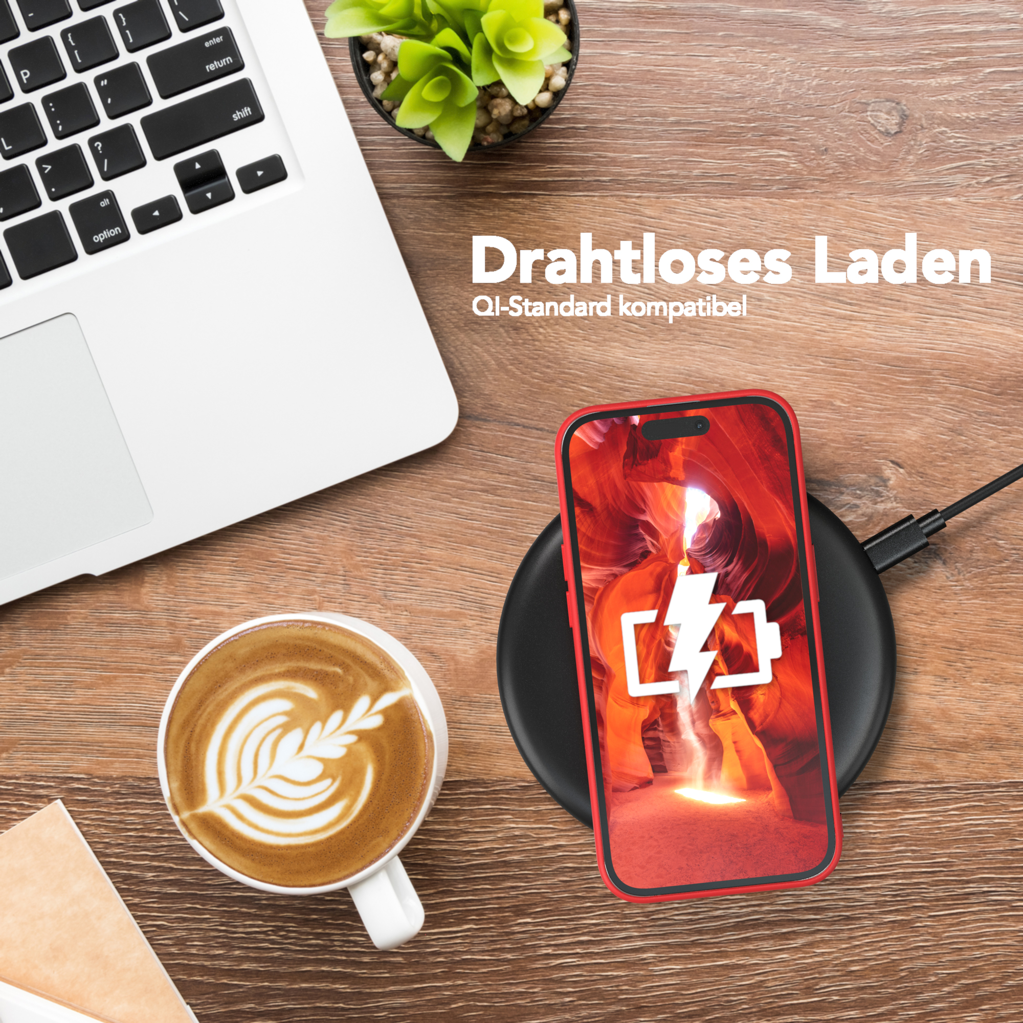 Laptop, Kaffeetasse, Telefon auf kabellosem Ladegerät. Text: 'Drahtloses Laden'. Rote Handyhülle.