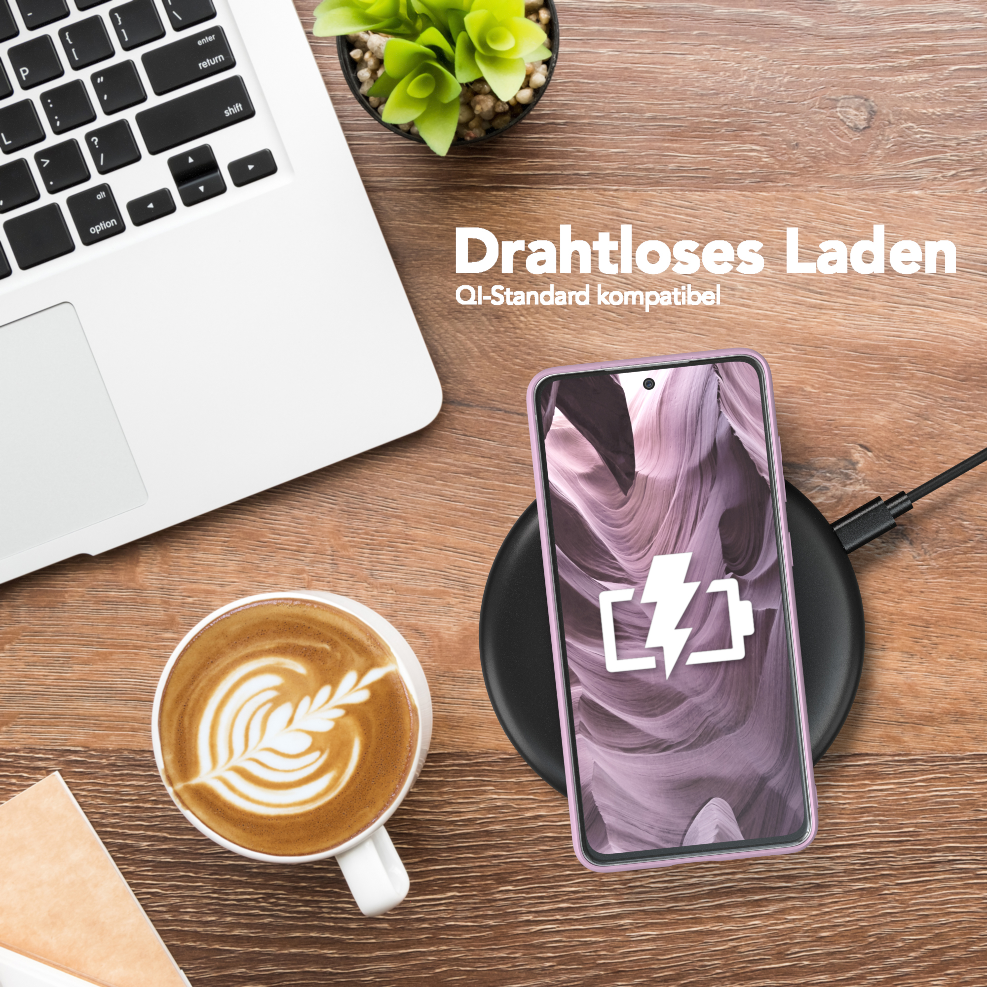 Telefon und Kaffeetasse auf einem Holztisch. Ein Laptop und eine kleine Pflanze sind ebenfalls sichtbar. Text: Kabelloses Laden.