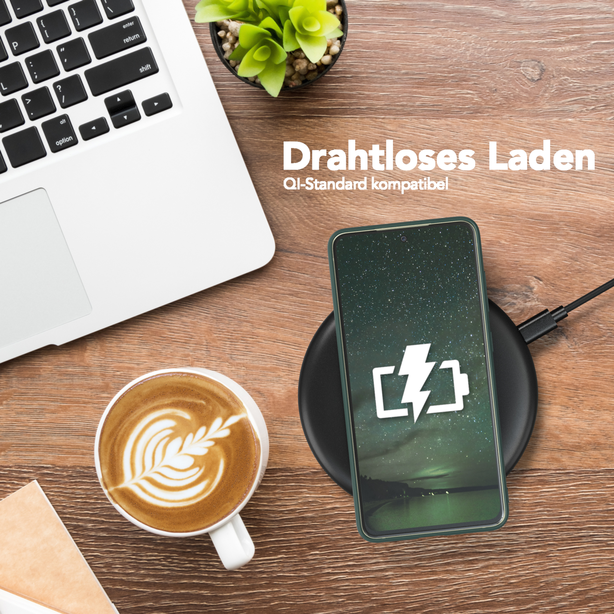 Laptop, Kaffee und Telefon auf einem Tisch. Telefon liegt auf einem kabellosen Ladegerät. Text: Kabelloses Laden, QI-Standard kompatibel.